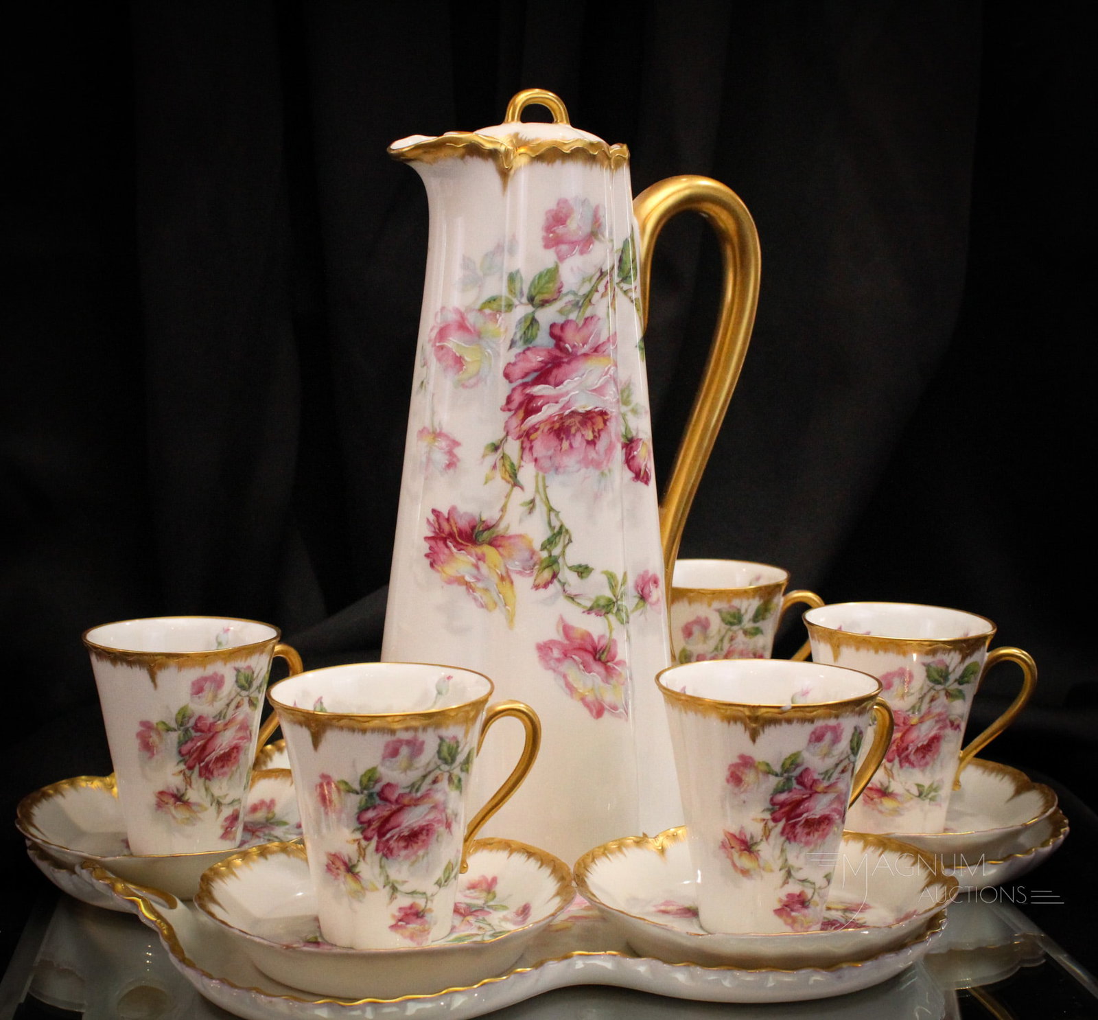 Haviland France Limoges Roses Porcelain Coffee Set with Tray: Lovely marked Haviland France Limoges coffee or chocolate set complete with matching tray. Set consists of coffee pot, tray, and five matching cups and saucers. One cup with chip at rim. Tallest measu