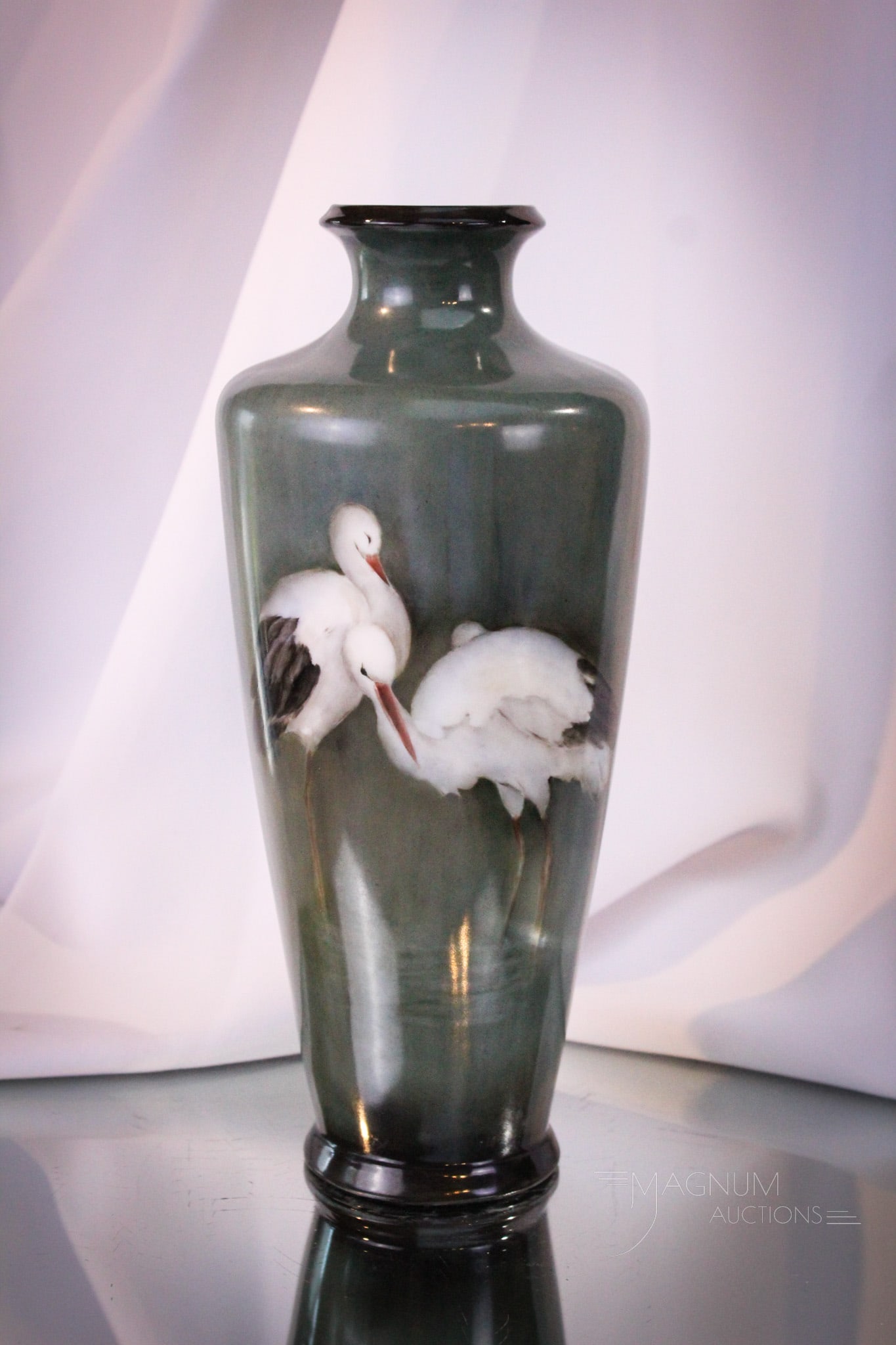 Hand Painted Porcelain Vase with Storks: Fine piece of hand painted porcelain in a classic form. Vase is decorated with well executed stork cranes. Vase measures 10 1/4" tall.