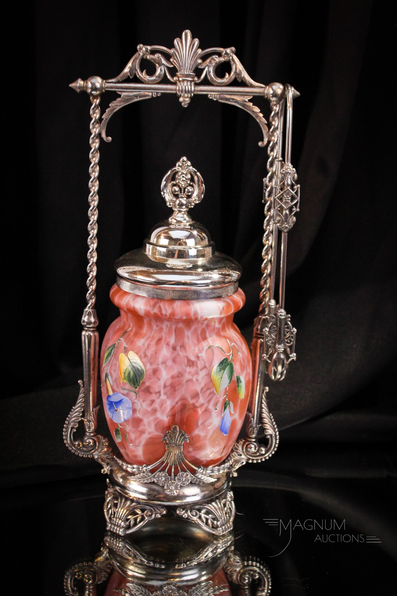 James Tufts Victorian Silverplate Enameled Glass Pickle Castor: Super find in this Victorian signed James Tufts silverplate pickle castor. Castor is complete with the original jar in a fine apricot spatter with enameled florals on each lobe. A must have for any se
