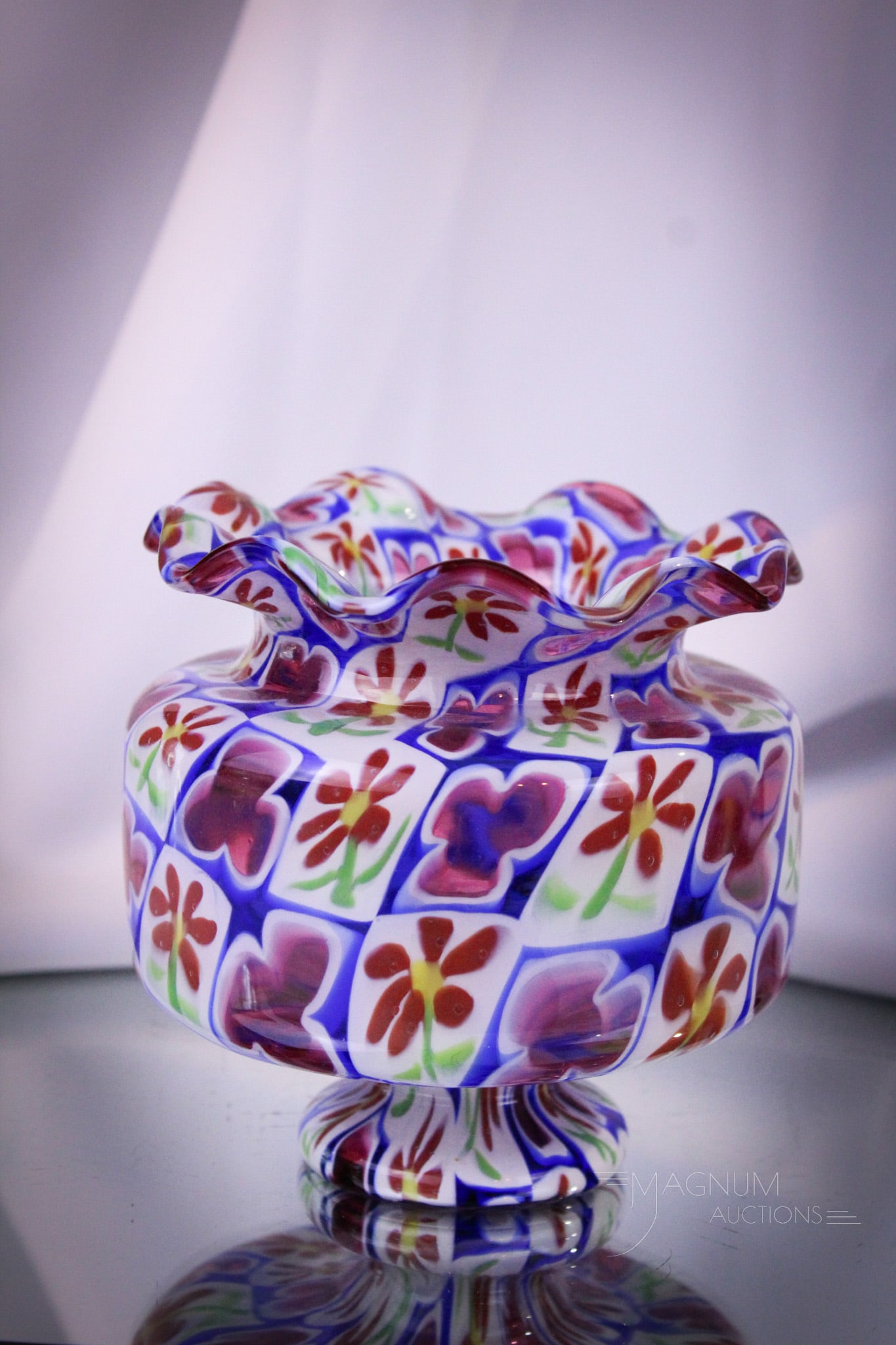 Fratelli Toso Murano Millefiori Art Glass Vase: Fine Fratelli Toso Murano Millefiori glass vase with daisy and clover motif. Vase measures 5" tall.