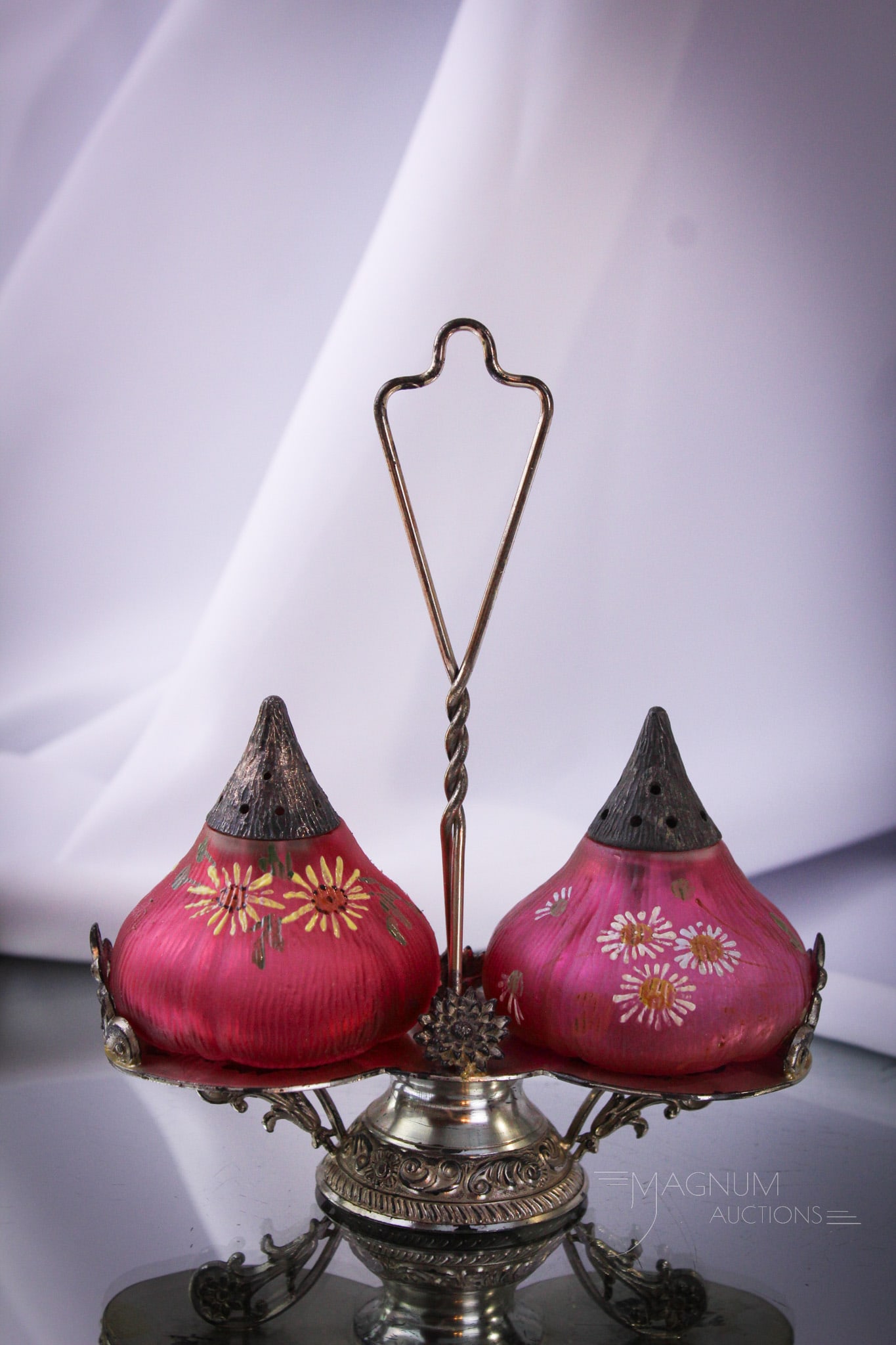 Aurora Silverplate Mt. Washington Cranberry Glass Fig Mold Shaker Set: What a selection we have here! This wonderful set features a signed Aurora silverplate holder along with a pair of Mt. Washington cranberry fig mold salt shakers. Lavish daisy decoration on each. Comp