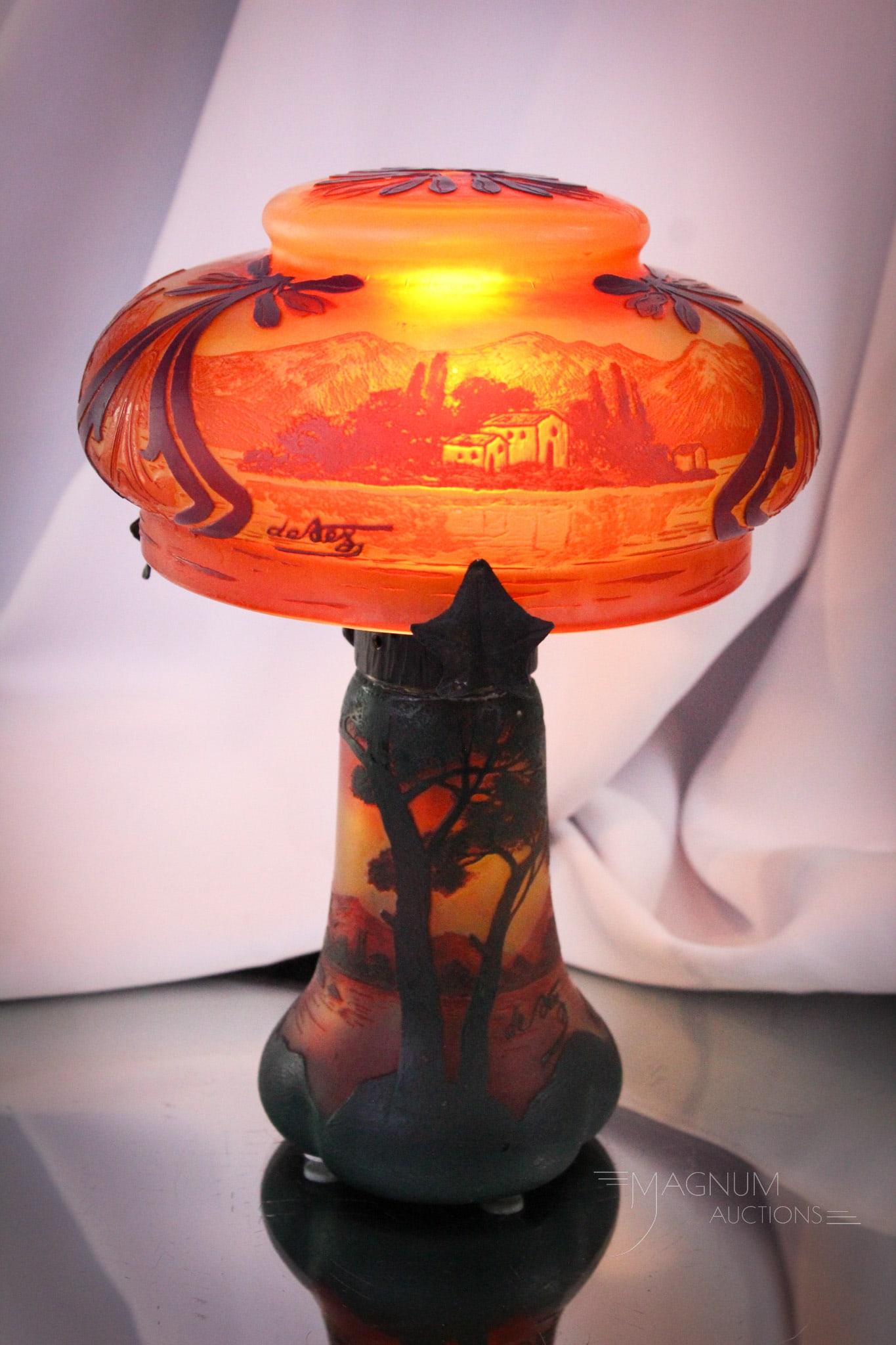 Signed Devez French Cameo Art Glass Boudoir Lamp: How super is this piece? Signed, "Devez" French cameo art glass boudoir lamp. This little guy measures only 9 1/2" tall and 6 1/2" wide. Signed both shade and base. Lake and cottage scenic design. As-