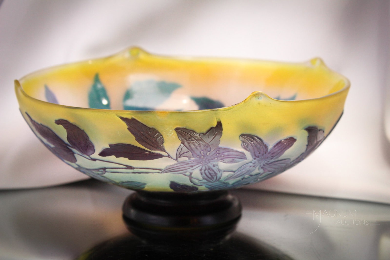 Signed Galle' French Art Glass Cameo Glass Bowl: Lovely example of a signed, "Galle'" French art glass cameo bowl. This piece with floral design on the body measures 3 1/2" tall, 8 1/2" in diameter.