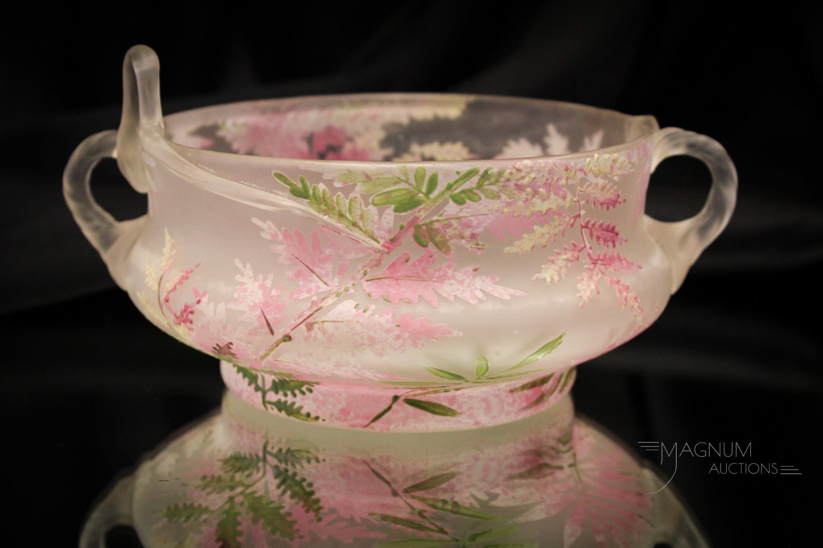 Enameled French Art Applied Glass Bowl: Lovely French art glass enameled fern frond bowl with applied glass vine handles. This piece features original paper label on the base. Bowl measures 3 3/4" tall, 7 1/2" in diameter.