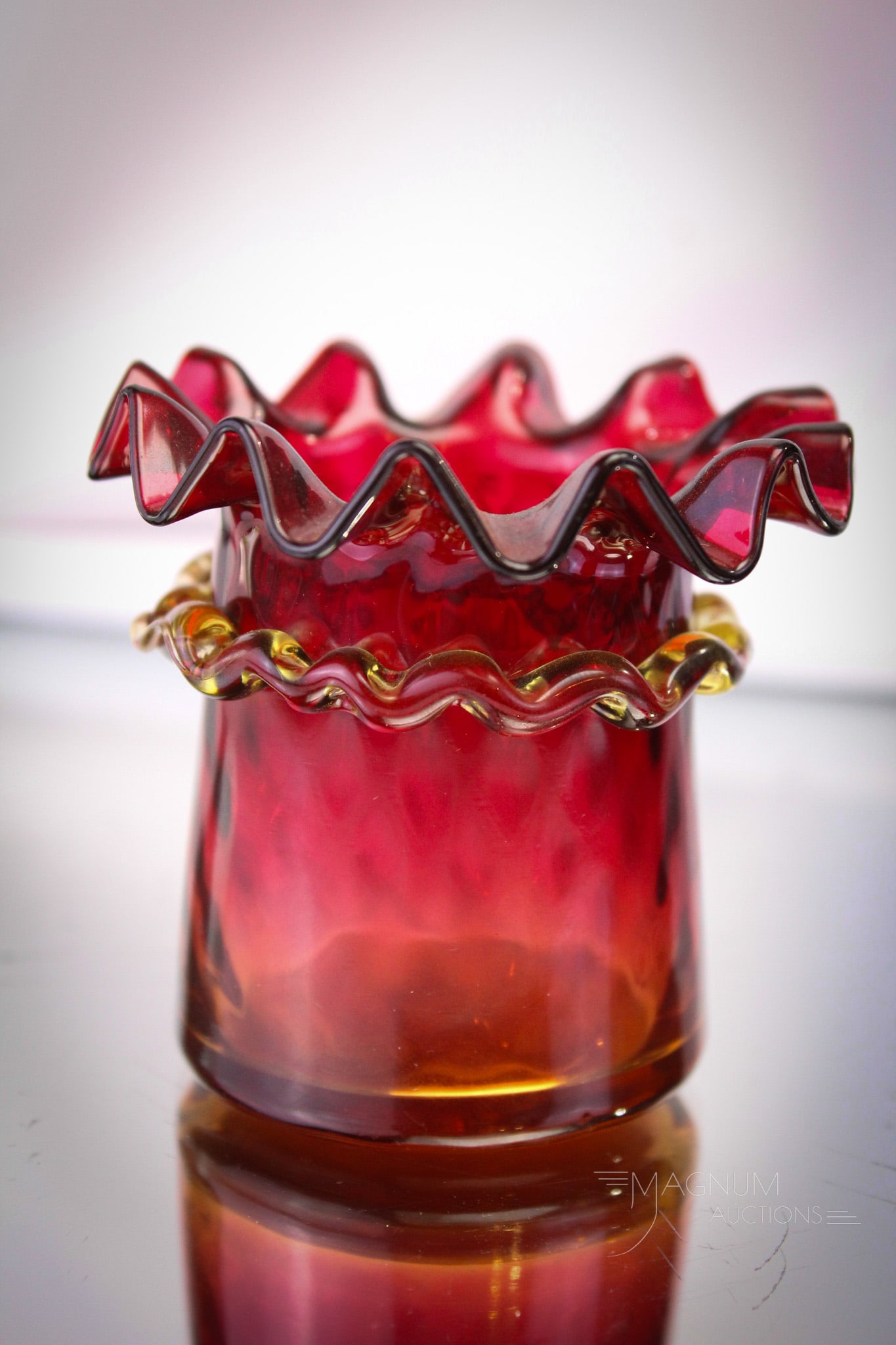 Mt. Washington Amberina Applied Rigaree Victorian Toothpick Holder: Wonderful and seldom found Mt. Washington amberina diamond quilt ruffled top toothpick holder. This beauty has a band of applied glass rigaree aorund the waist. Amazing example. Piece measures 2 1/2"