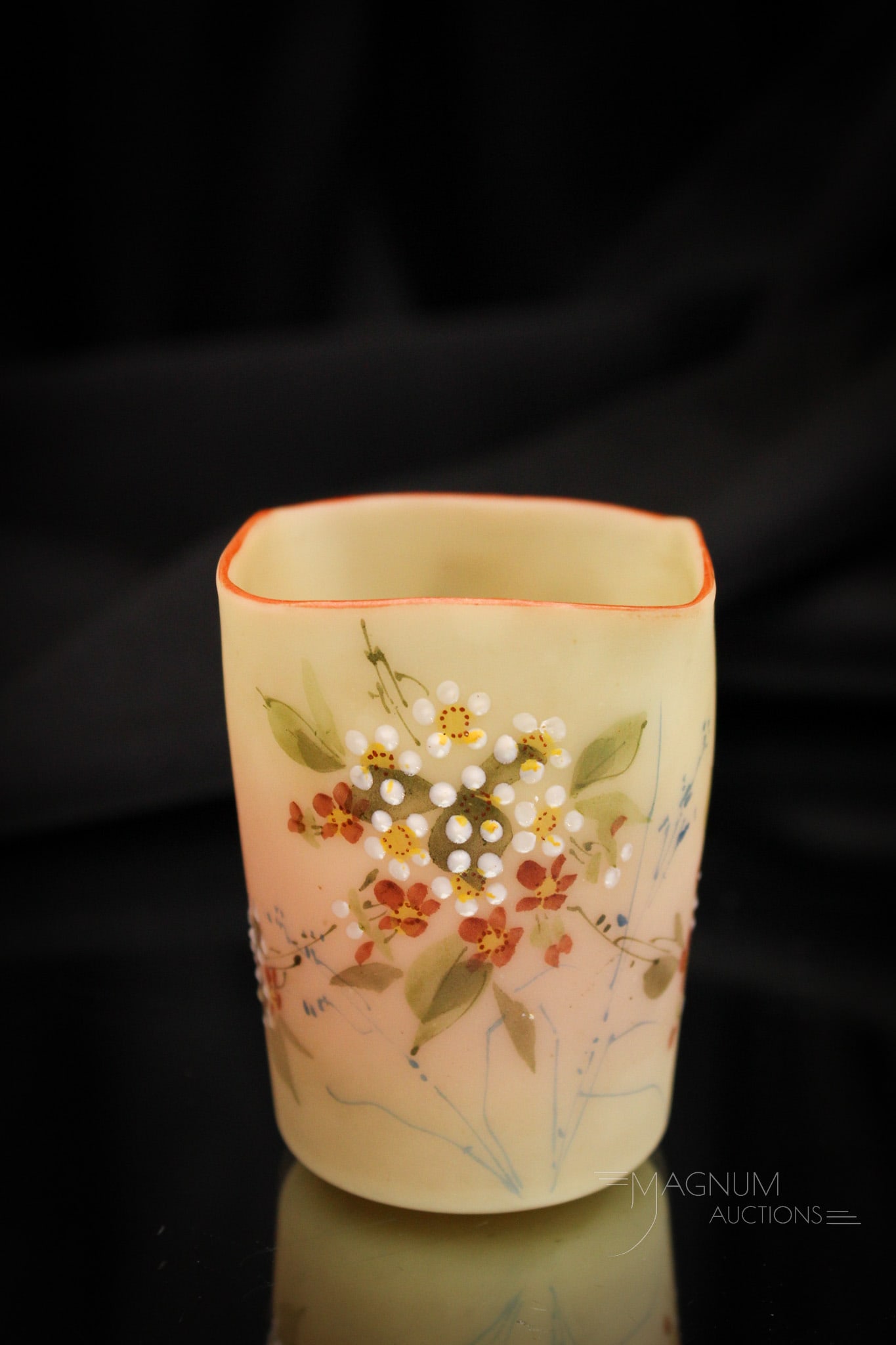 Mt. Washington Burmese Victorian Enameled Glass Toothpick Holder: Fine red line appears on the top edge rim of this beautiful Victorian Mt. Washington burmese glass toothpick holder. It also has wonderful florals adorning the body. Toothpick measures 2 1/2" tall. Pr