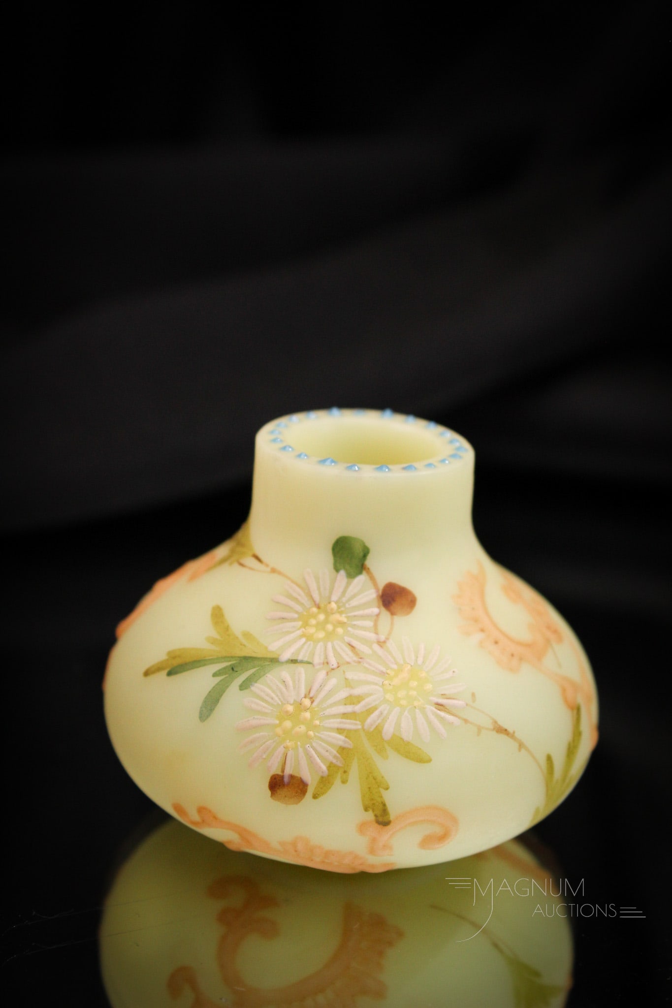 Mt. Washington Victorian Glass Unfired Burmese Toothpick Holder: Great find in this unfired burmese Victorian Mt. Washington glass toothpick holder. It has dainty daisy flowers around the body as well. Toothpick measures 2" tall. Provenance: This item is from the