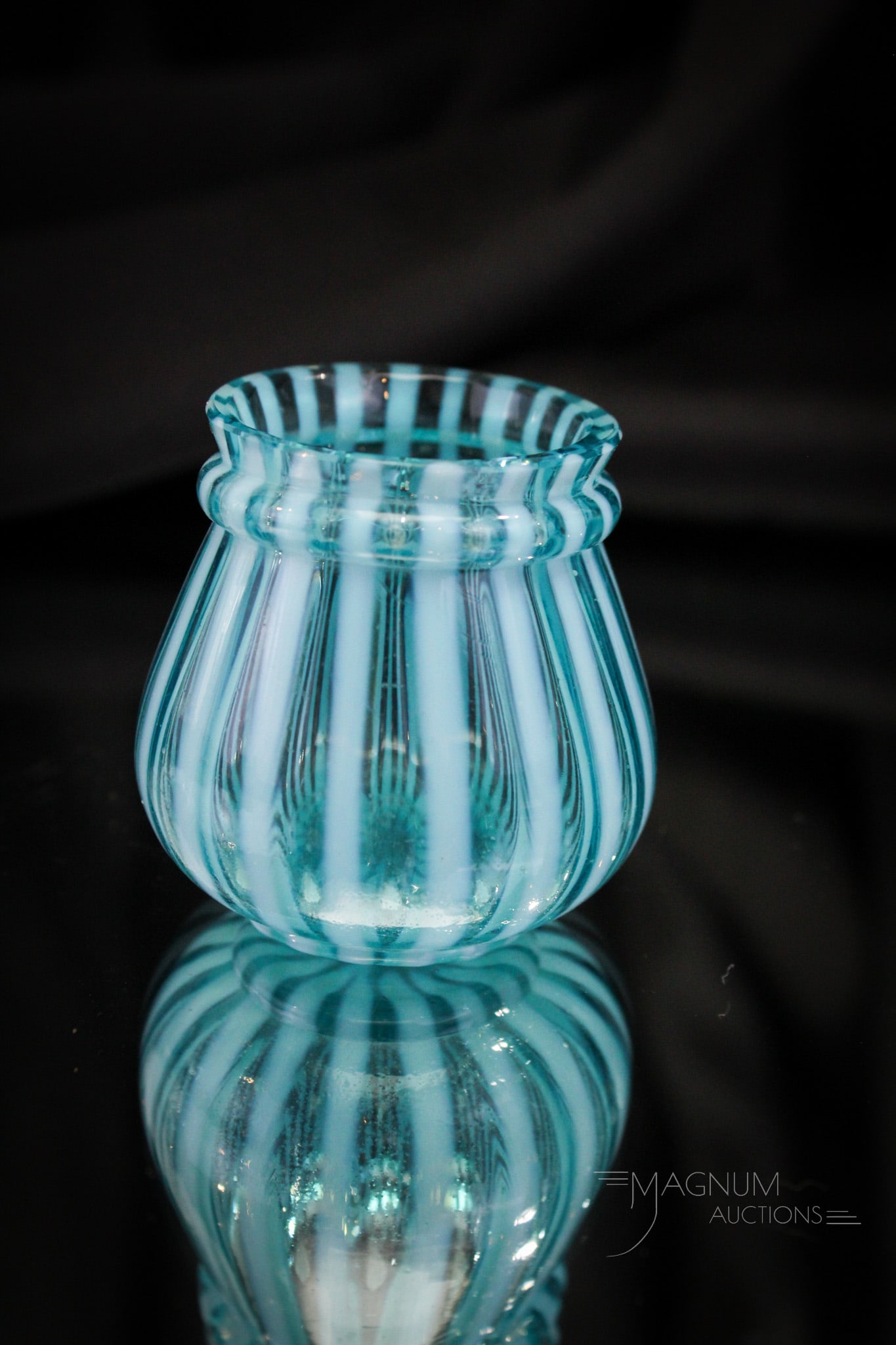 Northwood Blue Opalescent Ring Neck Stripe Victorian Toothpick Holder: Brilliant blue opalescent Northwood blue opalescent Ring Neck Stripe pattern Victorian toothpick holder. This example has great color and opal. Piece measures 2" tall. Rim has been reduced from origin
