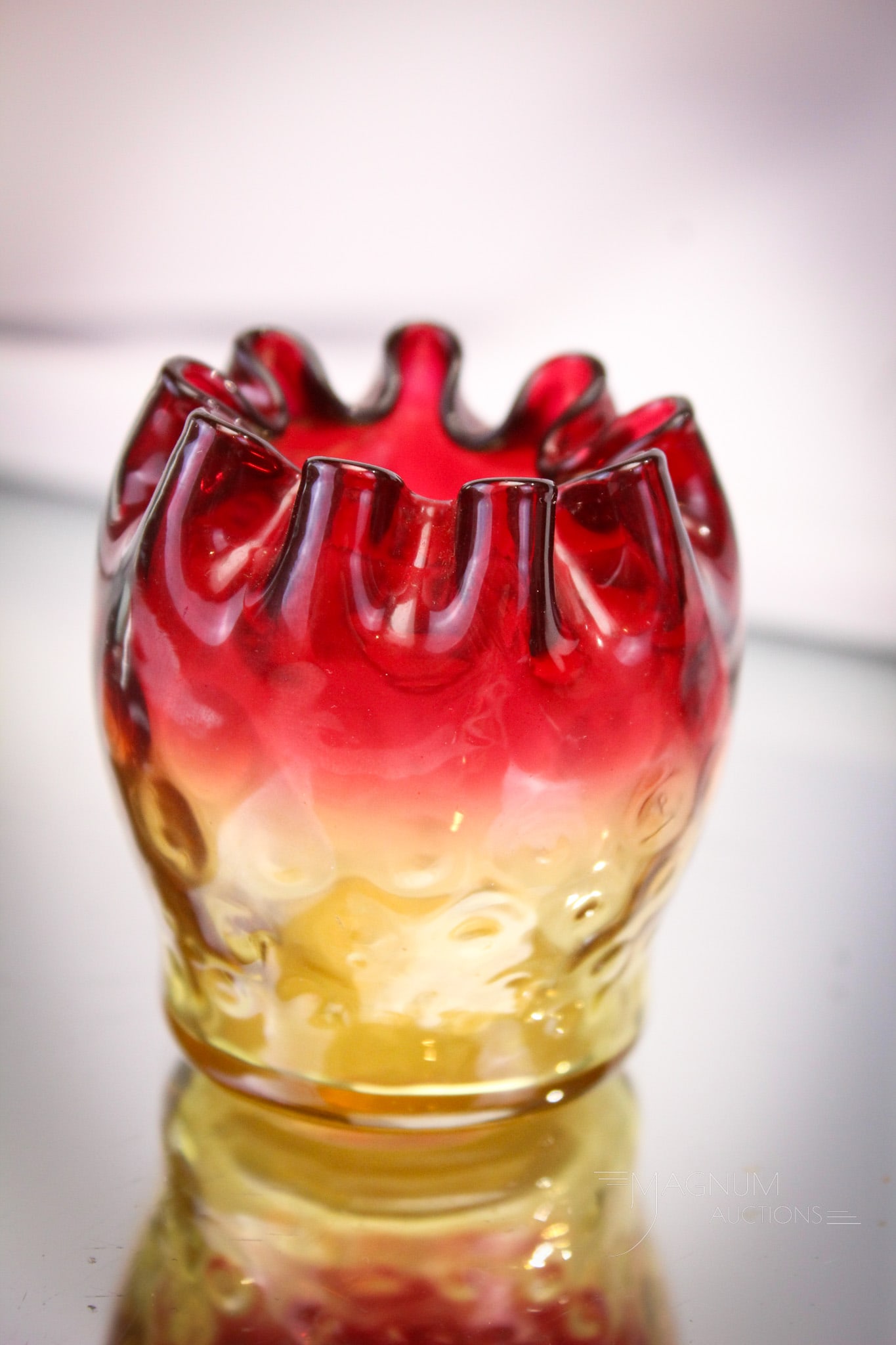Mt. Washington Victorian Amberina Glass Toothpick Holder: Beautiful Victorian Mt. Washington amberina with corset body and turned-in top rim. This one measures 2 1/4" tall. Provenance: This item is from the private collection of Eileen Flaks. Eileen and her