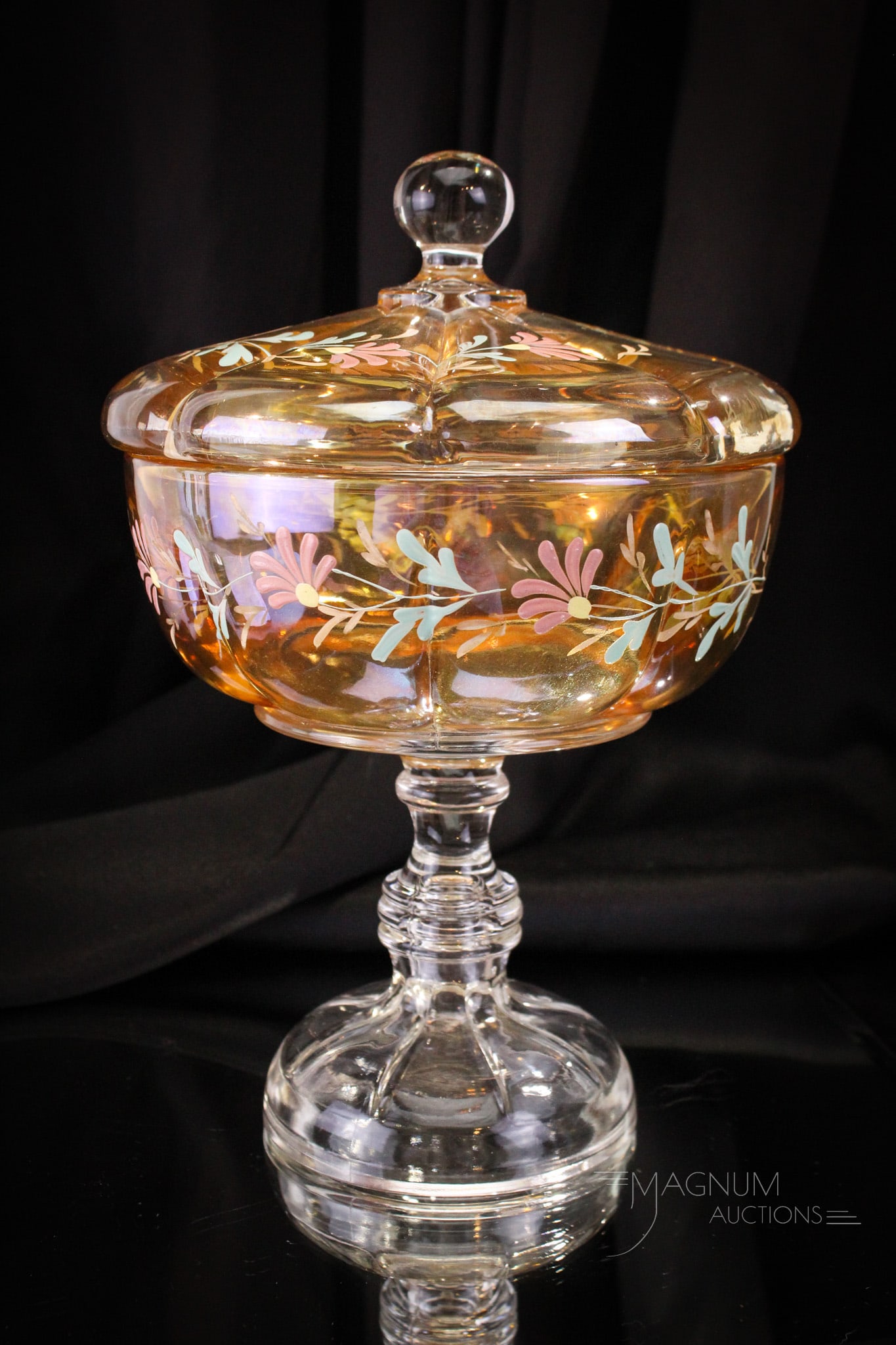 Scarce Riverside Marigold Decorated X-Ray Covered 11 1/2" Compote: Beautiful find in this marigold stained Riverisde X-Ray pattern enameled covered compote. Piece is a fine example. It measures 11 1/2" tall. Provenance: This item is from the private collection of Eil