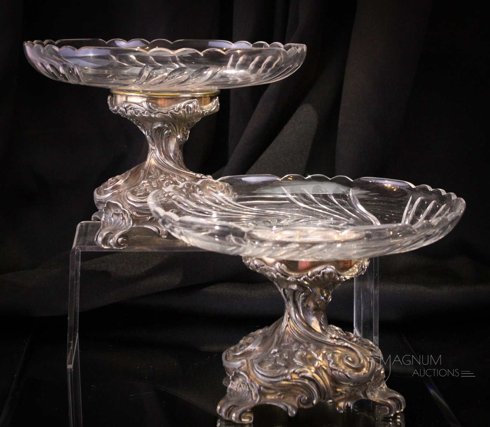 Pair Continental Glass & Silverplate Pedestal Compotes: Fine pair of continental silverplate and cut glass compotes. Each measures 6" tall, 9" in diameter.