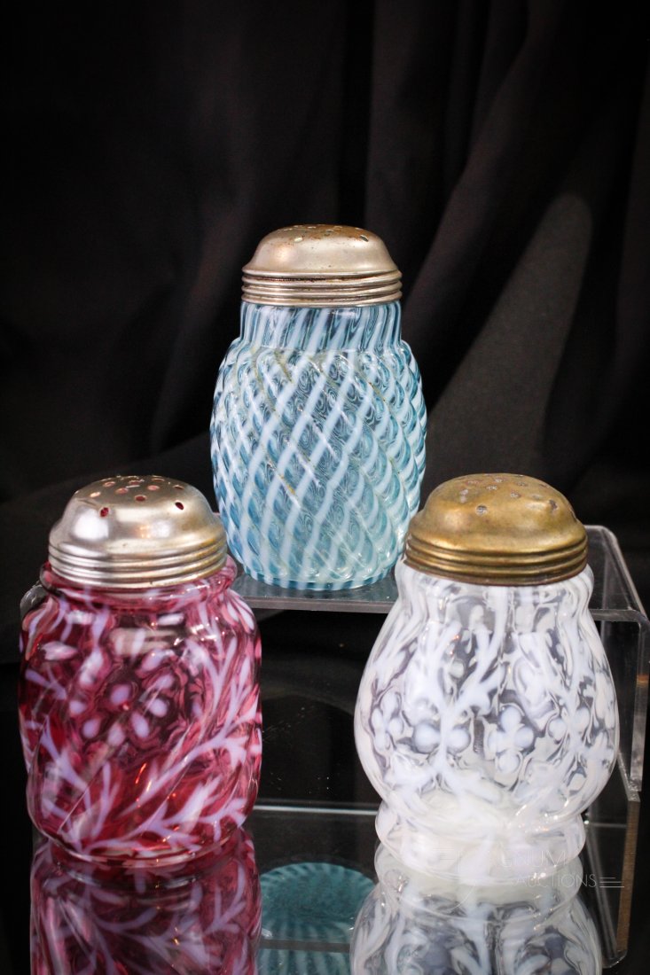 3 pc Lot Victorian Cranberry Blue Opalescent Sugar Shakers: Three fine exdamples of Victorian suga shakers. Each as nice as the next. Included in this fine offering is an opal Spanish Lace, a blue Reverse Swirl, and completed by a Northwood cranberry Daisy & F