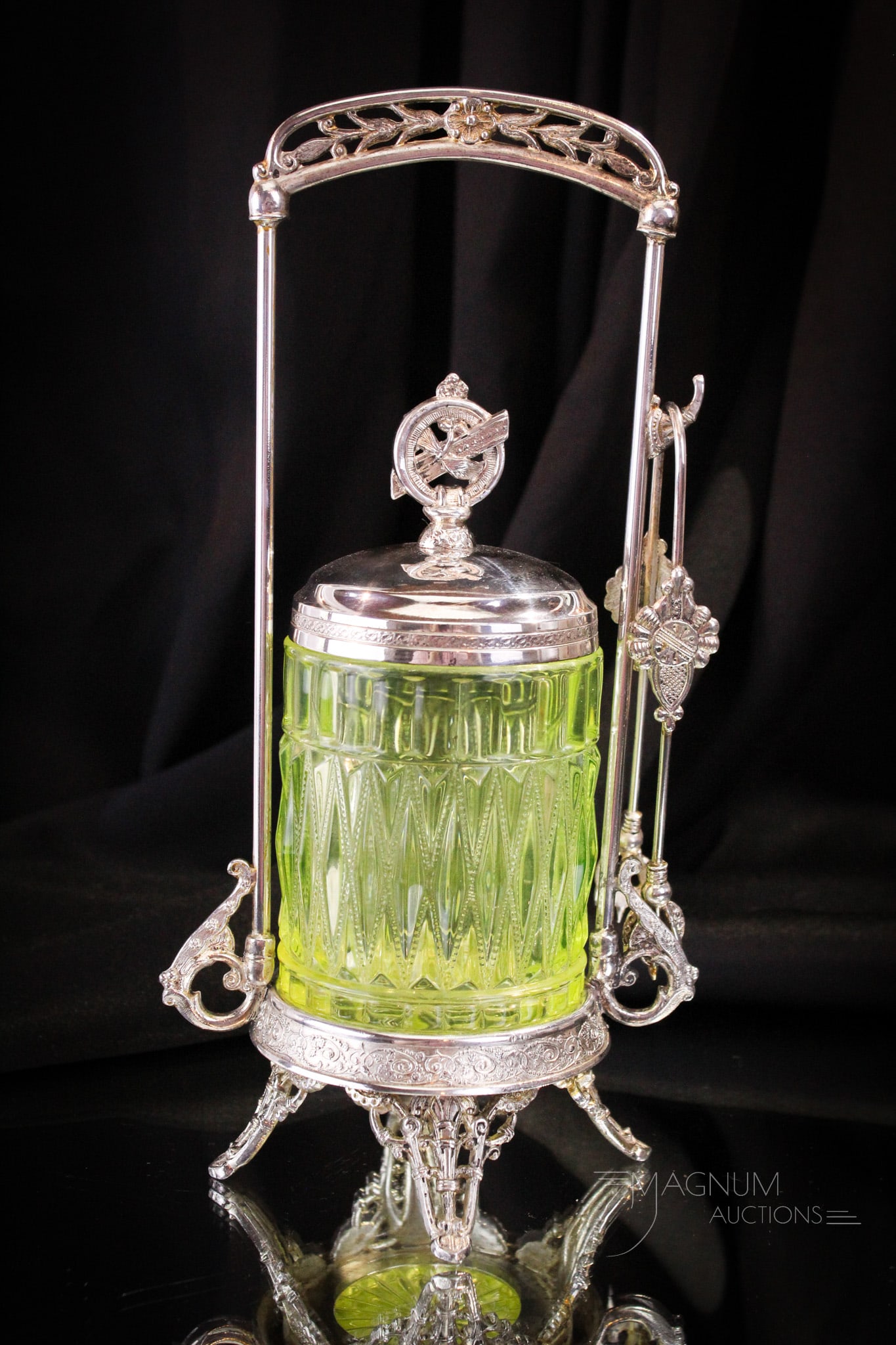 Derby Victorian Silverplate Vaseline Ellipse & Diamond Pickle Castor: A gorgeous Victorian Derby silverplate pickle castor complete with vaseline Ellipse & Diamond insert. This is a super addition to any vaseline or castor collection. This one measures 11" tall.