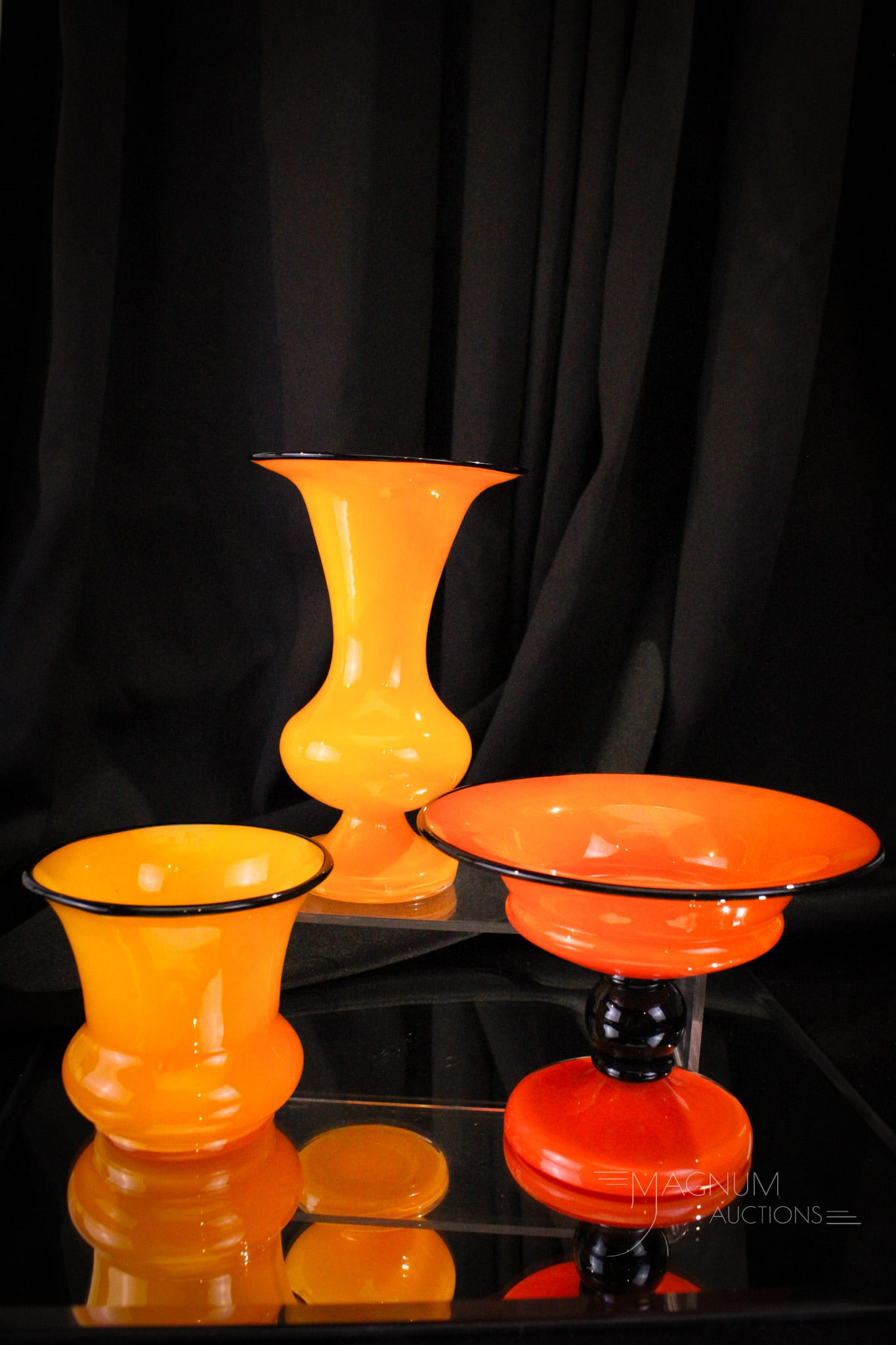 3 pc Lot Czech Tango Art Deco Glass: Three fine examples of Czechoslovakia Tango art glass. Each piece with applied black glass rim. Tallest measures 7".