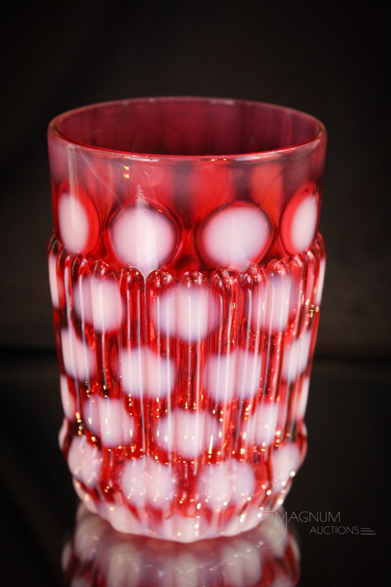 Scarce Northwood Cranberry Opalescent Ribbed Coin Spot Victorian Tumbler: A fine example of this tough, tough to find tumbler in Victorian opalescent glass. This one with the best color and opal. It measures 3 3/4" tall.