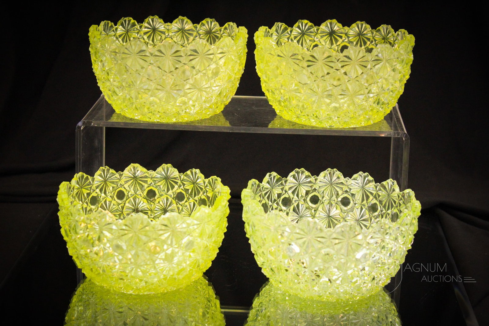4 pc Lot Victorian Vaseline Daisy & Button Bowls: Four fun examples of vaseline Daisy & Button pattern in the form of cereal bowls. Each sparkles in the light. Each measures 2 1/2" tall, 4 3/4" wide.