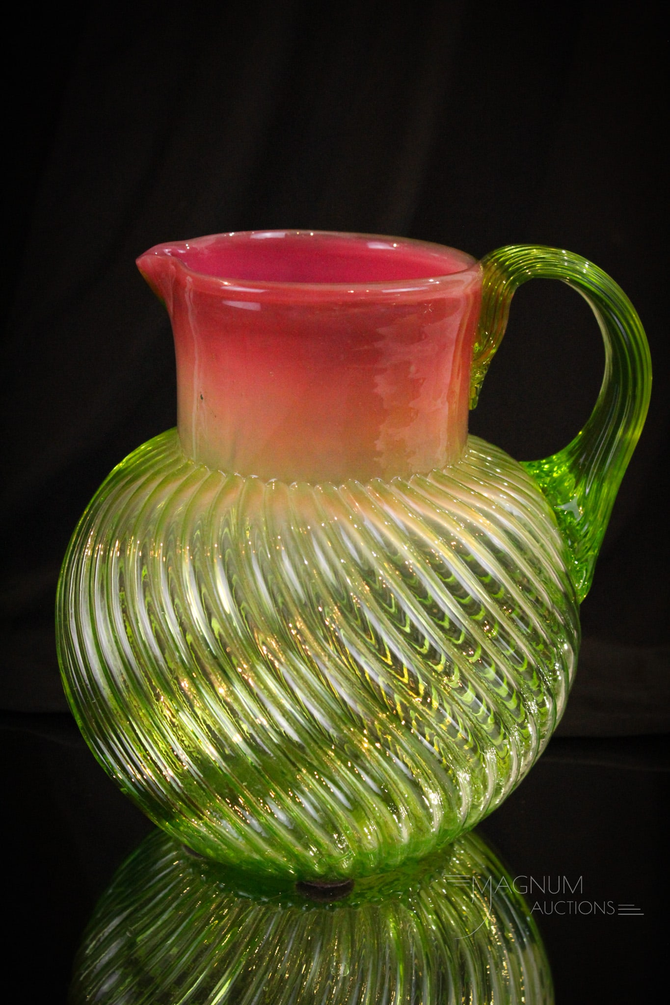 Victorian Uranium Green Pink Opalescent Water Pitcher: Stunning water pitcher in grapefruit pink opalescent to uranium green glass body with swirled mold exterior ribs. Talk about ribbed for pleasure folks! This is wonderful.Attributed to Stevens & Willia