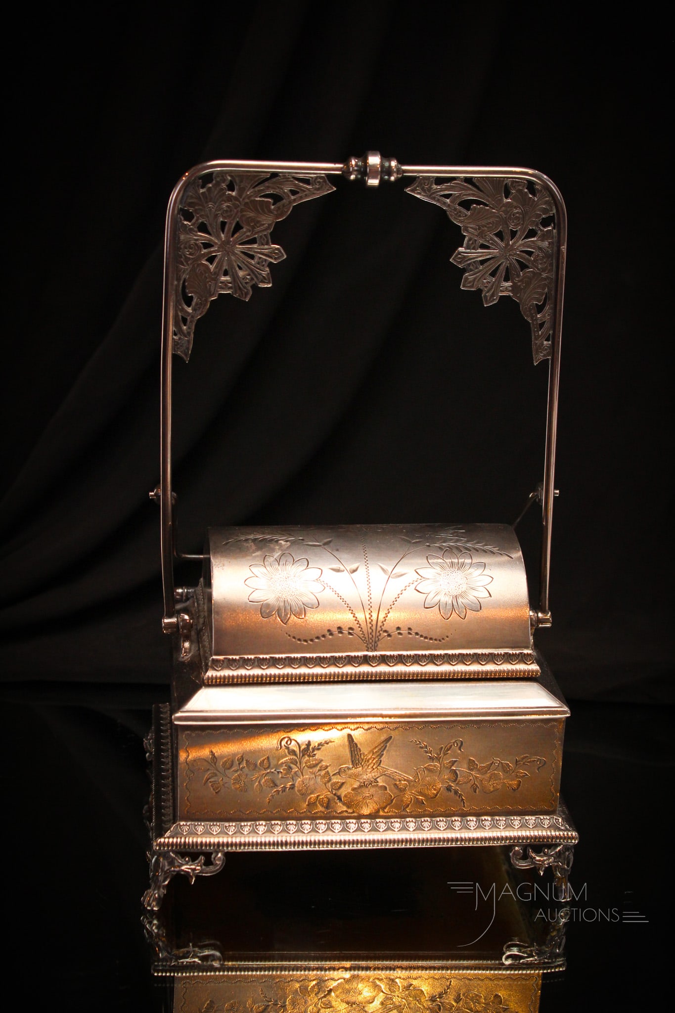 Wilcox Victorian Silverplate Mechanical Jewelry Casket: Lovely signed Wilcox Victorian silverplate mechanical jewelry casket with green velvet lining. Floral and bird engraved decoration.