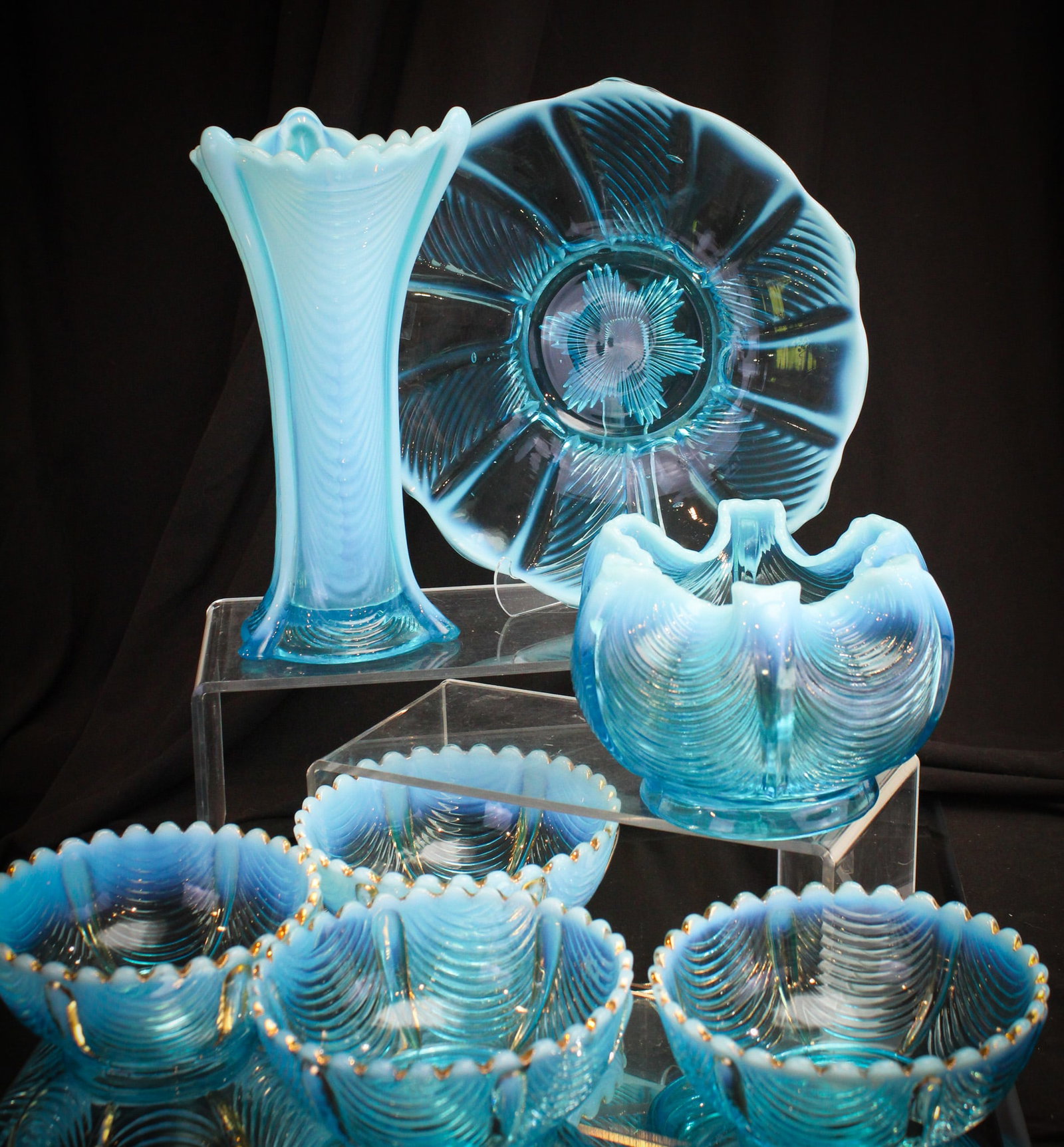 7 pc Lot Victorian Northwood Blue Opalescent Drapery Glass: Fine generous offering of seven pieces of Northwood blue opalescent Drapery pattern. Included in the lot is a vase, plate, rose bowl, and four bowls.