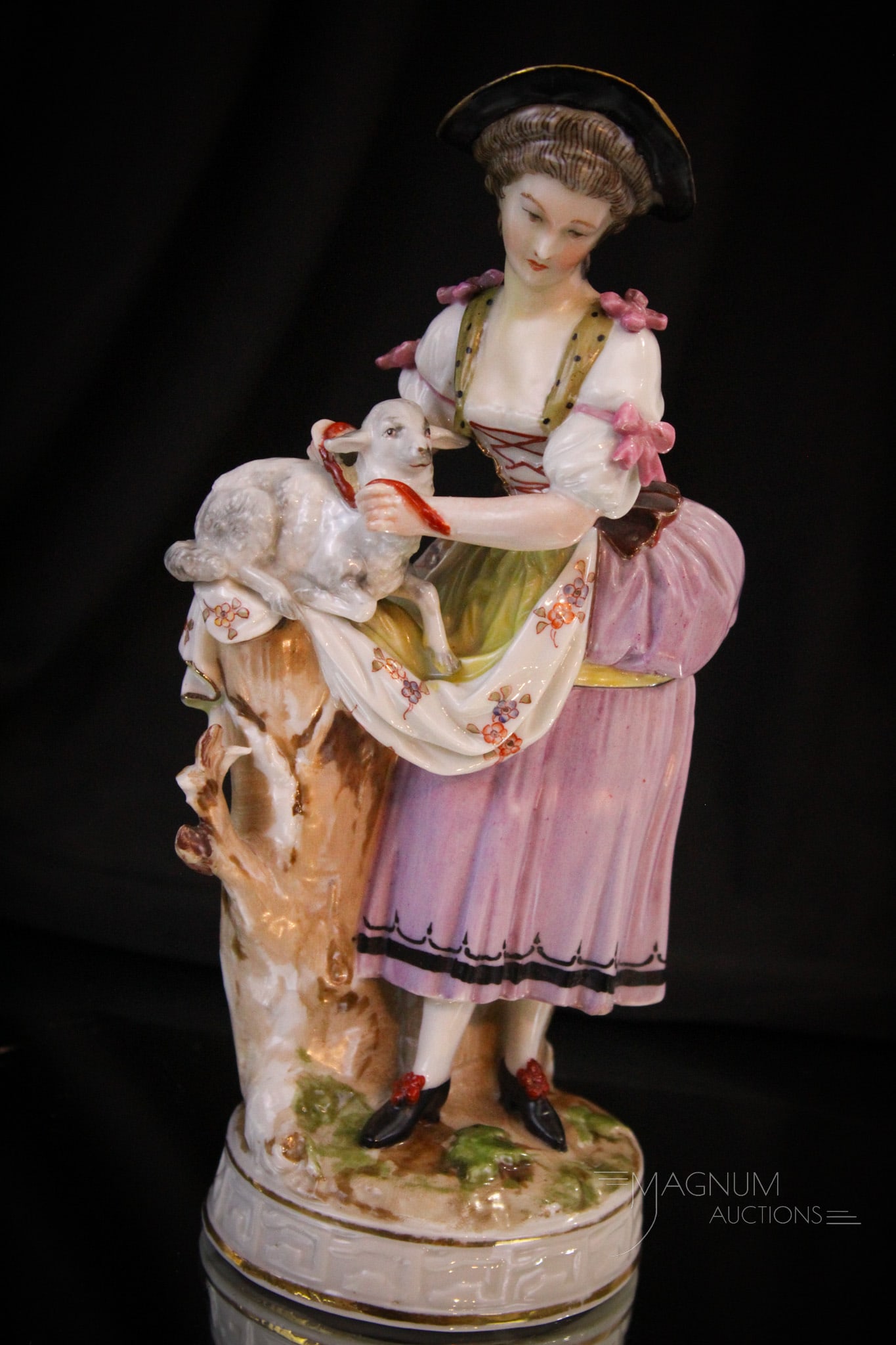Signed Meissen Lady with Sheep Porcelain Figurine: Beautiful signed Meissen porcelain figurine of a lady with sheep. Delicate details around on this fine piece. Figurine measures 8 1/2" tall.