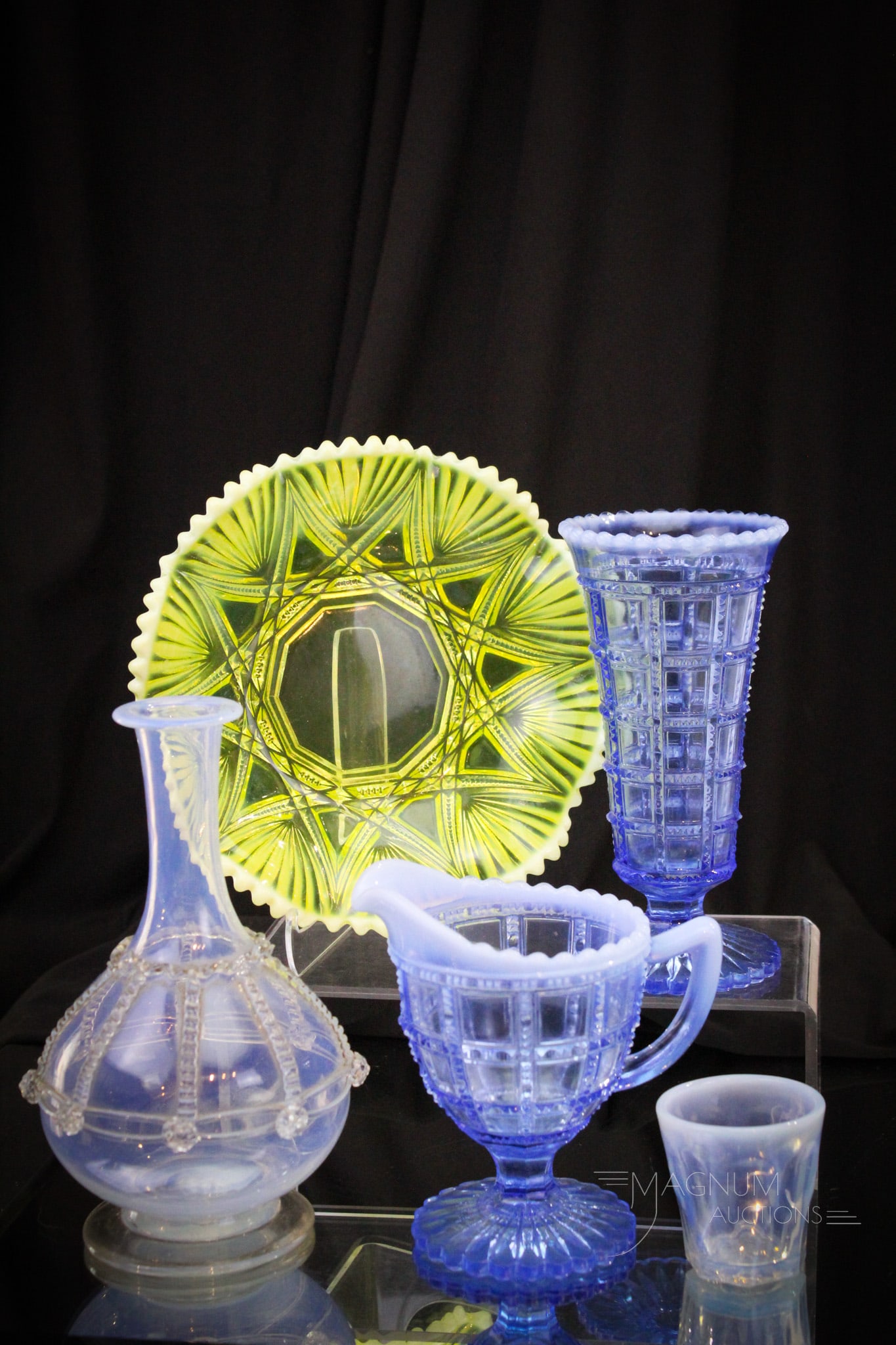 5 pc Lot Victorian & More Opalescent Glass: Five fine finds in opalescent glass represented by unique forms and makers. The first offering is a blue opal Beaded Block pattern creamer and vase. Also an opal shot glass, an opal decanter lacking s