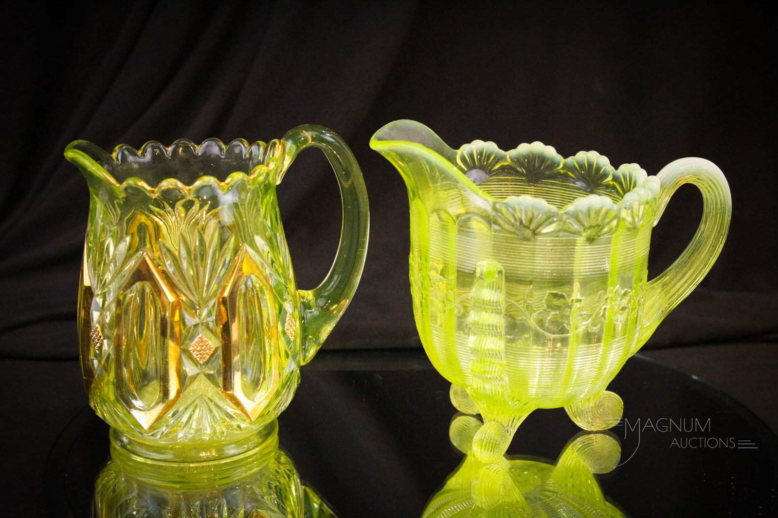 2 pc Lot Victorian Vaseline Glass Riverside & Northwood Creamers: Two fun finds in Victorian vaseline decorated glass creamers. Included in the lot is a Riverside Derby pattern creamer with gilt decoration along with a Northwood jackson example. Tallest measures 5 1