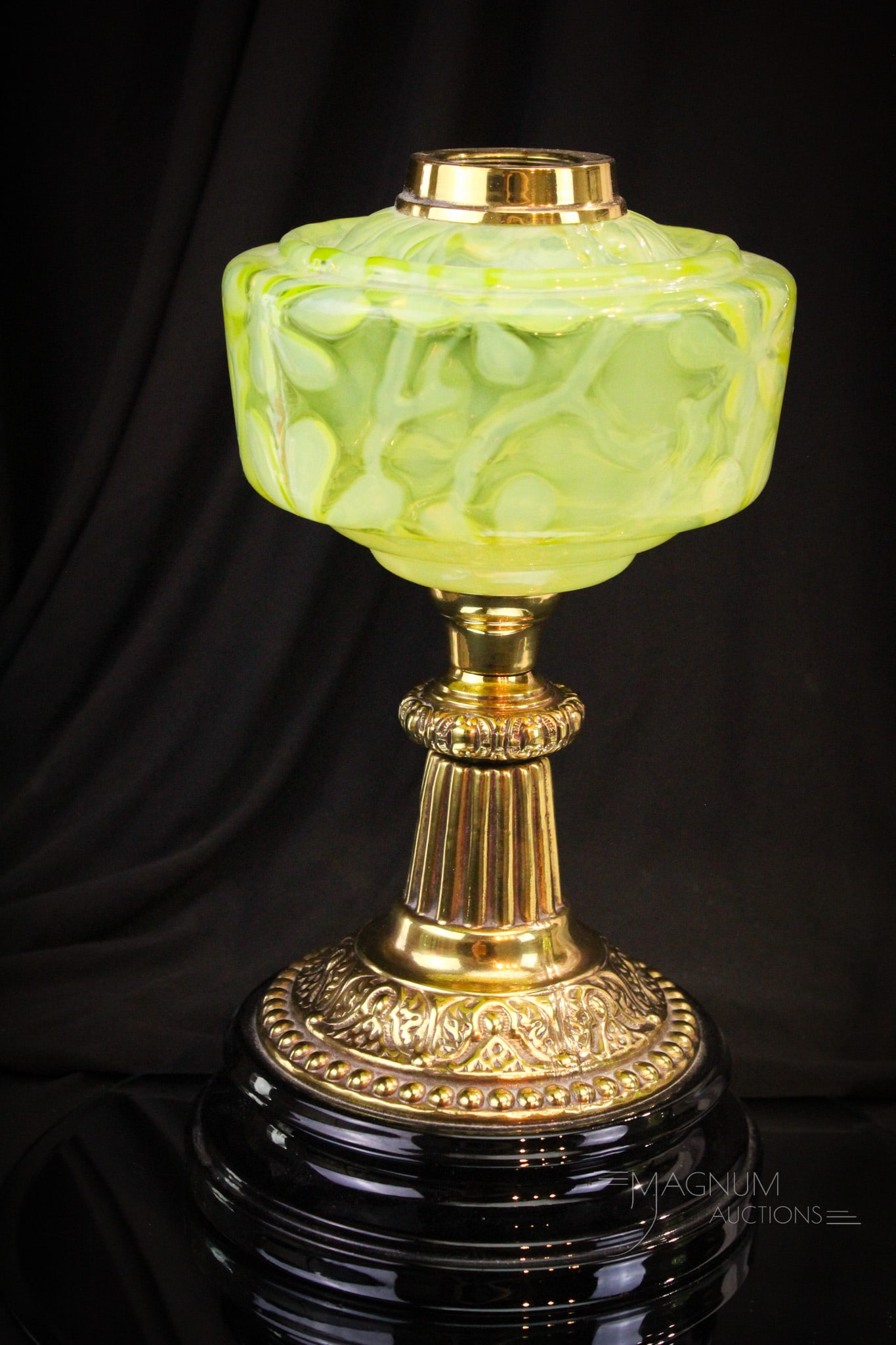 Vaseline Opalescent Victorian Oil Banquet Lamp: Amazingingly large vaseline opalescent Victorian oil lamp complete with brass stem and black glazed pottery base. This lamp in the "Bob's Plumeria" pattern. Fine example with great opal and vivid colo