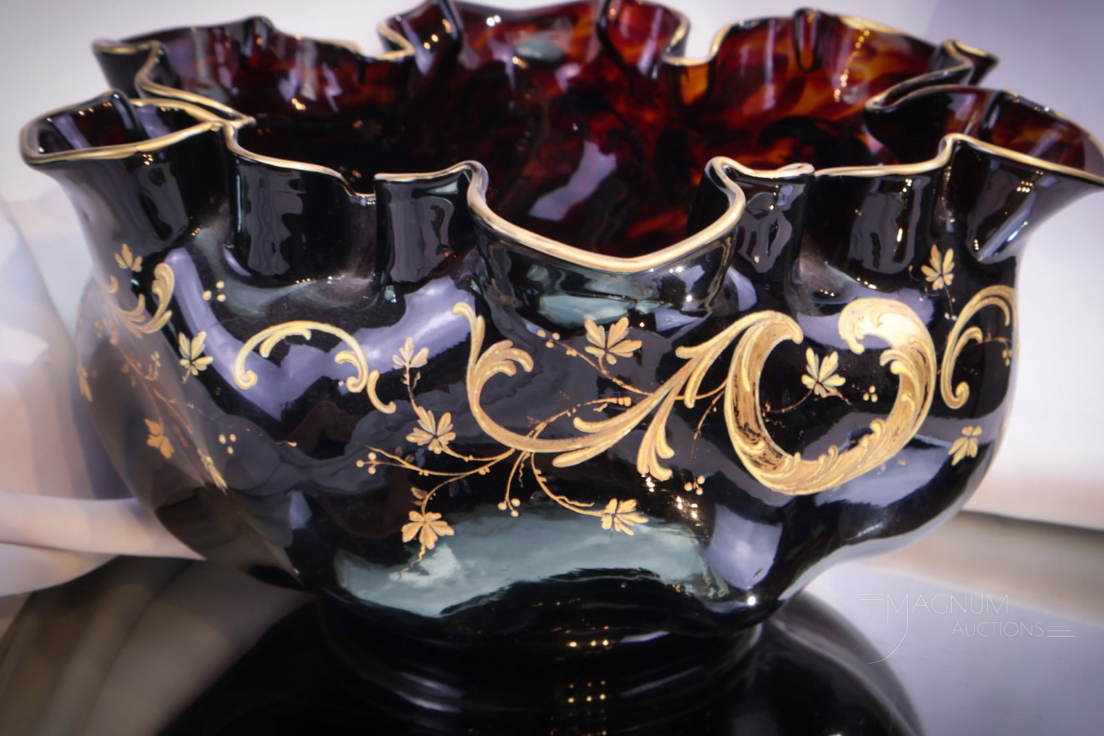 Victorian Oxblood Spatter Gilt Melon Ribbed Art Glass Brides Bowl: Rare coloring for this melon ribbed Victorian art glass brides bowl. This lovely bowl is a deep oxblood spatter color. Graciously enhanced by lovely gilt decoration around the whole piece. Bowl measur