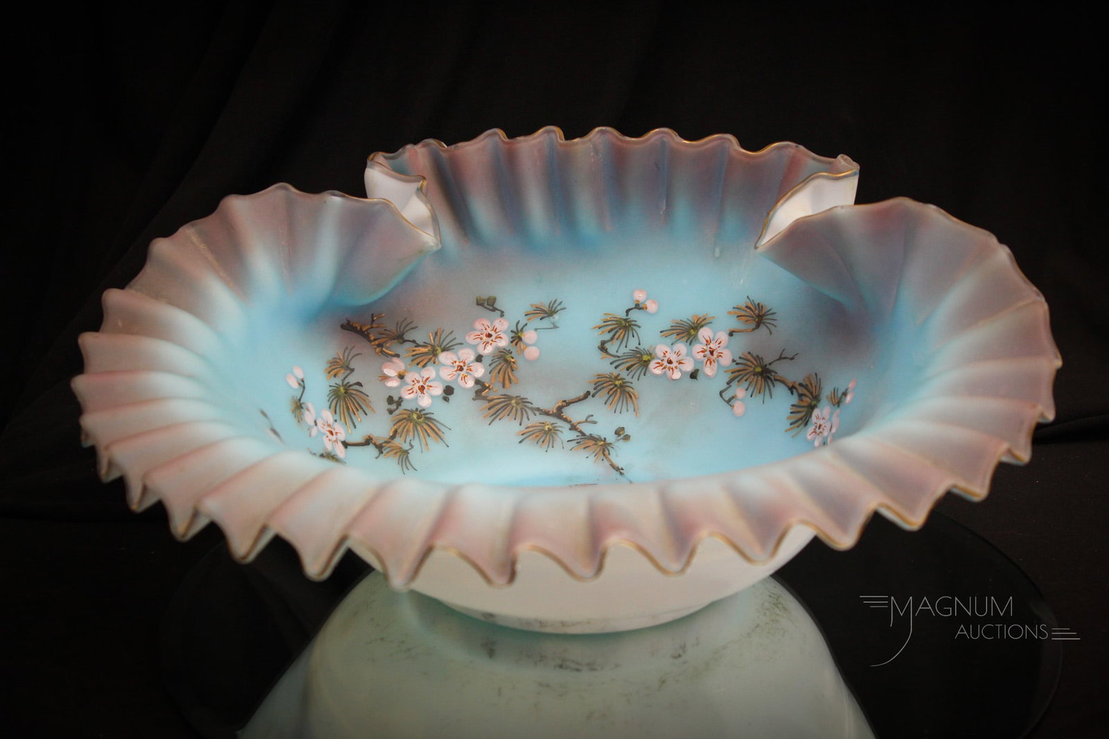 Huge Victorian Glass Brides Bowl Centerpiece: Huge Victorian glass brides bowl with folded up back and ruffled front. Enameled florals decorate this fine bowl. Complete piece measures 5" tall, 13" wide, and a 4 5/8" fitter rim.