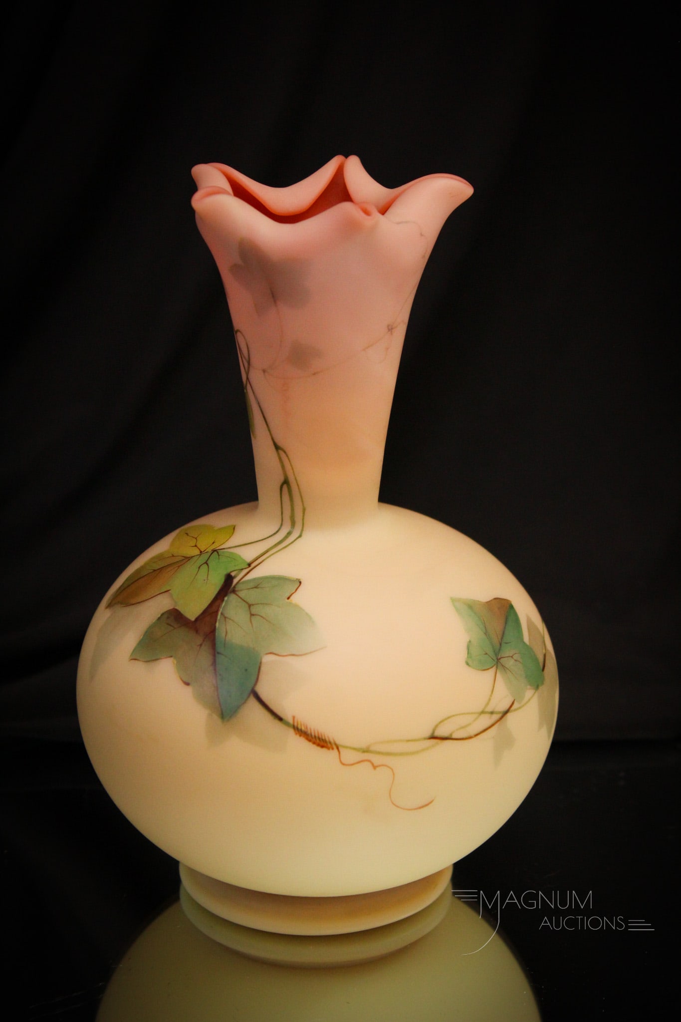 Webb Burmese Victorian Glass Ivy Decoration Glass Vase: Fine selection of Webb burmese Victorian glass. This one with ivy decoration around the body. Vase measures 7" tall.