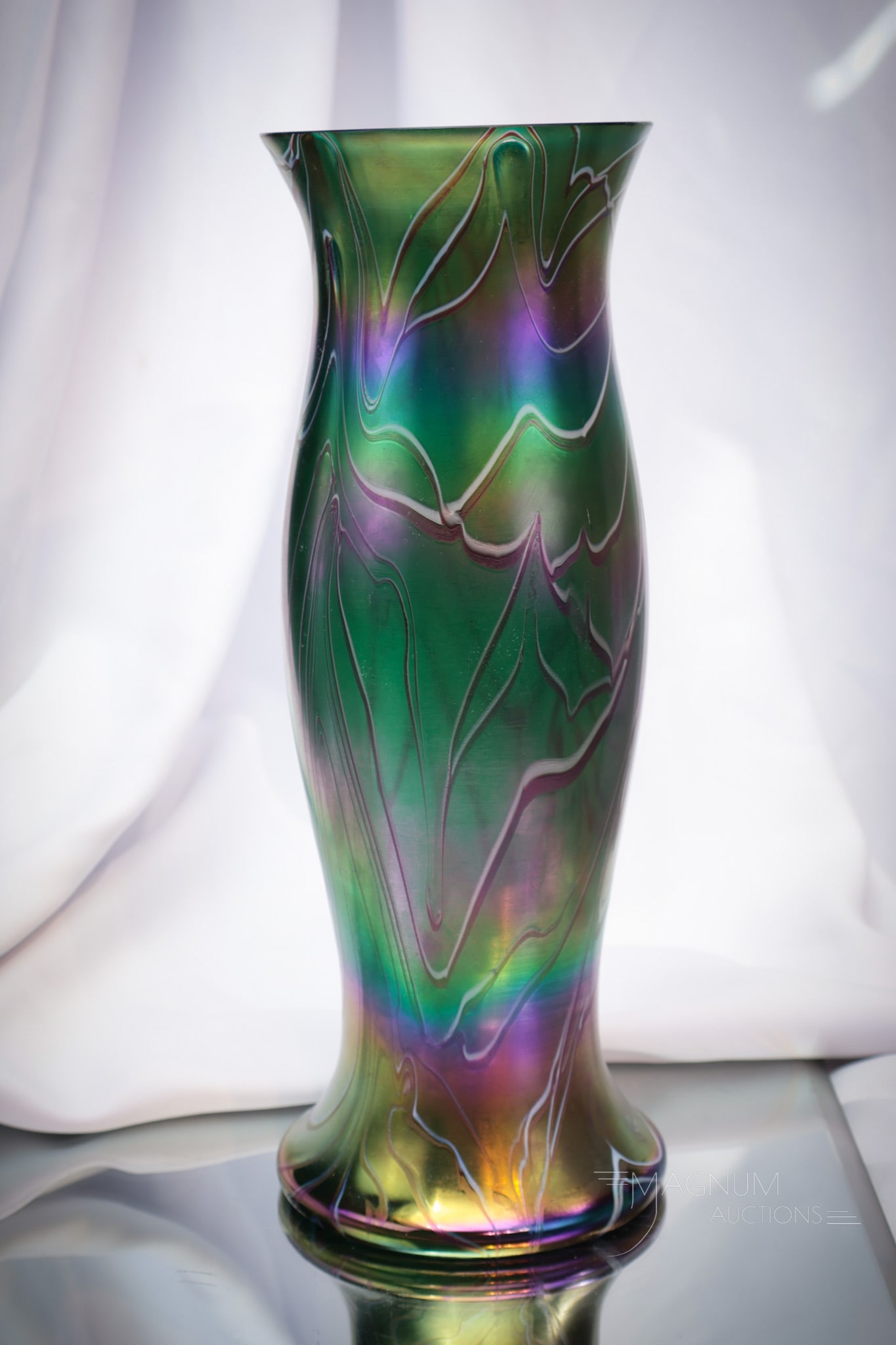 Austrian Kralik Glass 14" Irridescent Glass Vase: Select find in this Austrian irriescent glass 14" tall vase. Attributed to Kralik, this will be a welcome addition to any art glass collection.