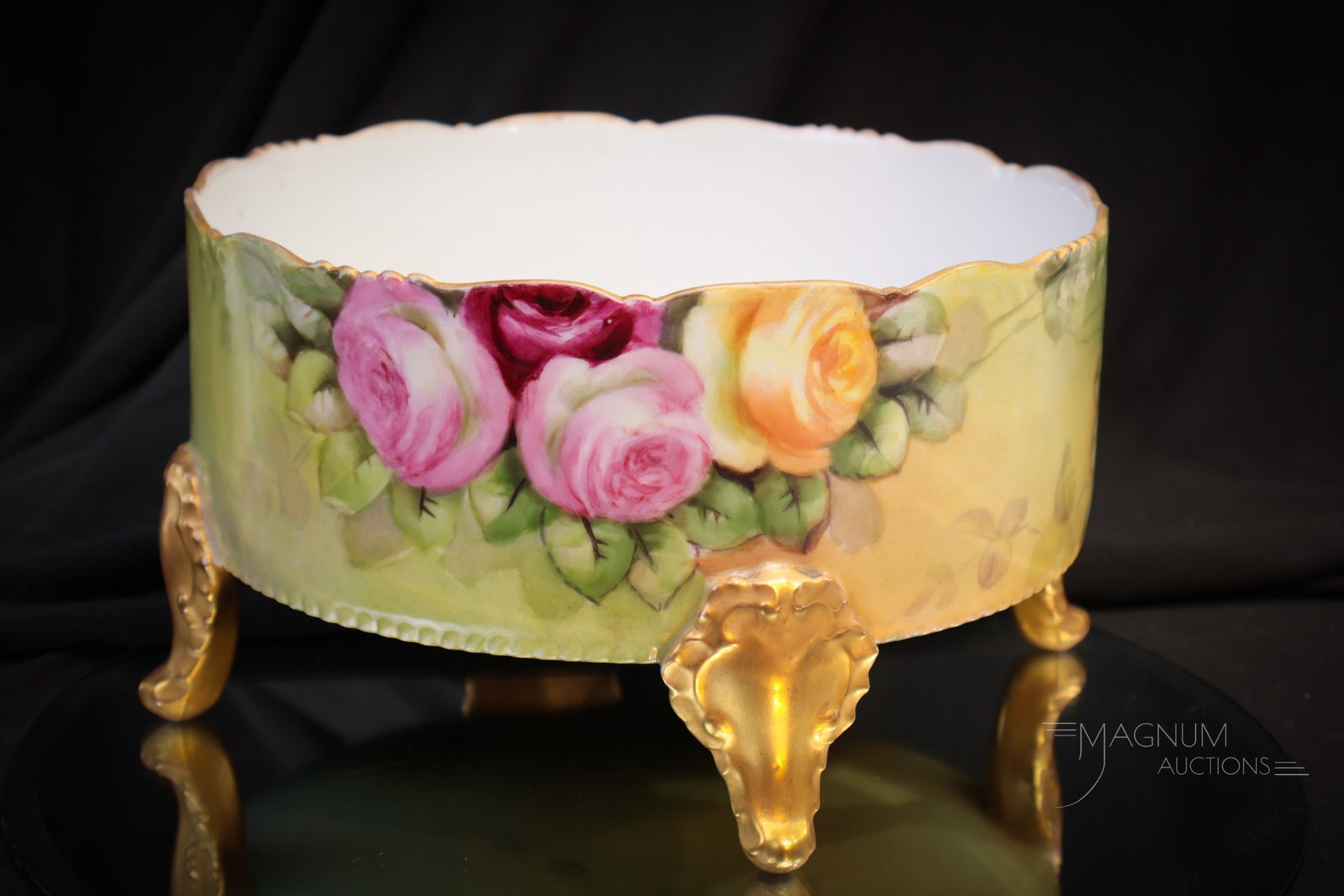 Limoges France Roses & Gold Hand Painted Porcelain Ferner: A plethra of multi colored roses encompass the body of this signed Elite Works Limogfes France hand painted porcelain ferner. This example with lots of gold and setting on four feet. Measures 5" tall,