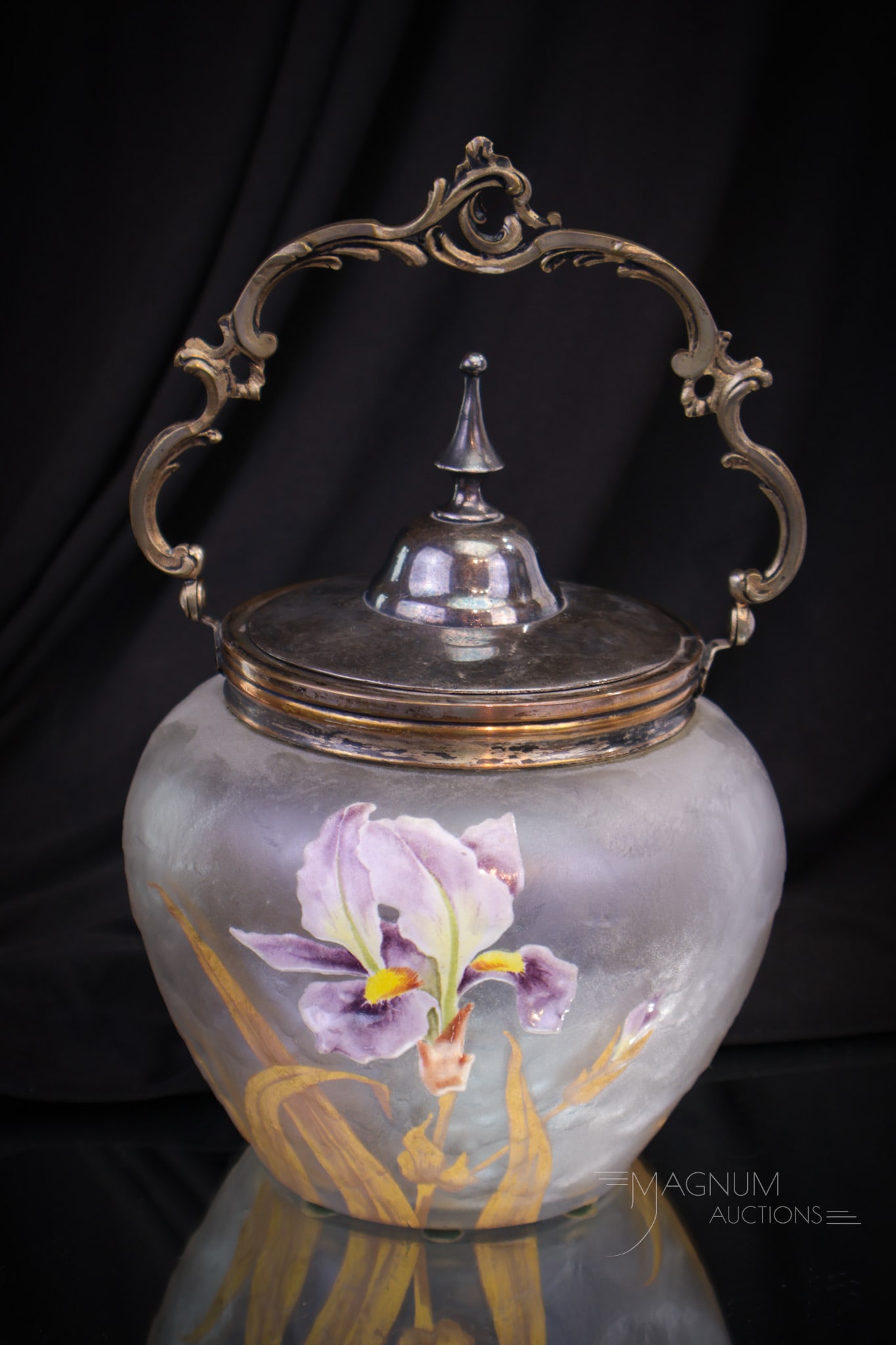 V. S. French Acid Textured Art Glass Enameled Iris Biscuit Jar: Fine marked V. S. French acid textured art glass enameled biscuit jar. Piece is complete with silverplate mountings and lovely heavy enameled iris decoration. Measures 8" tall.