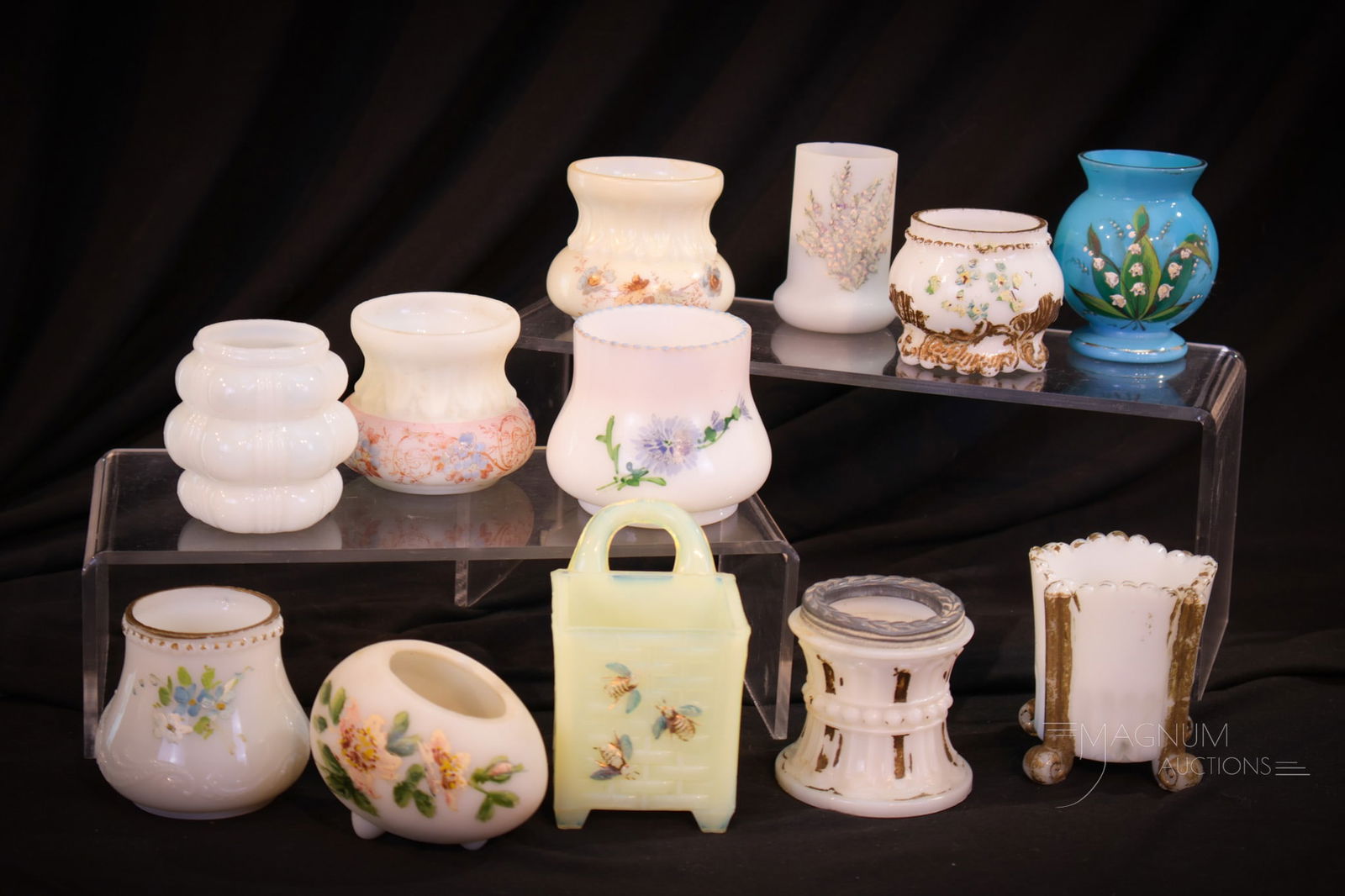 12 pc Lot Opaque Victorian Glass Toothpick Holders: Twelve fine and desirable finds in this offering of opaque glass toothpick holders. Each with their own story to tell. Tallest measures 3". Provenance: This item is from the private collection of Eil