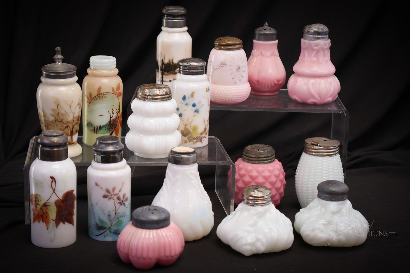 16 pc Lot Victorian Glass Salt Shakers: Sixteen fanciful salt shaker finds in this more than generous offering. This lot is for the die hard Saltie. Bid high and strong for this lot. Tallest measures 4".