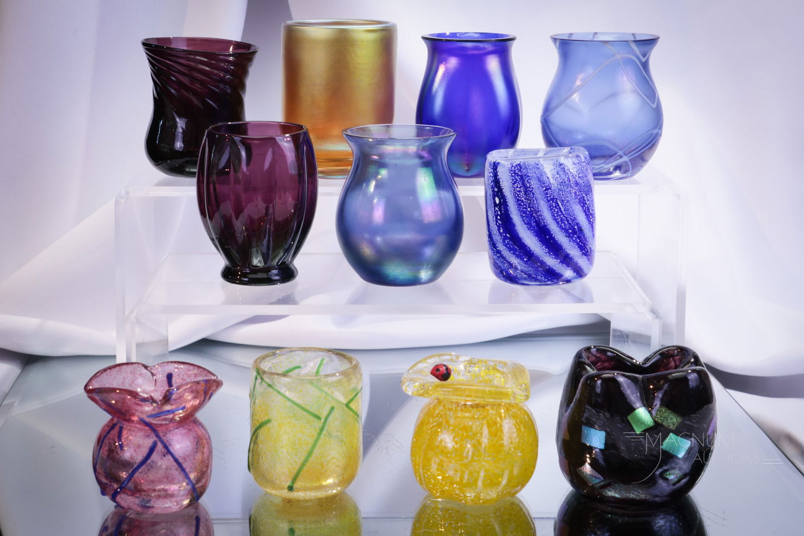 11 pc Lot Contemporary Art Glass Toothpick Holders Lundberg & More: Eleven fine examples of contemporary art glass toothpick holders including various makers. Included in the lot is a signed Lundberg. Tallest measures 2 1/2".