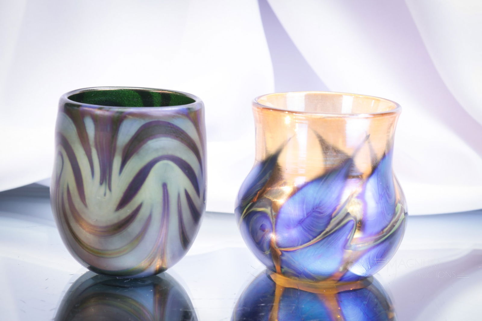 2 pc Lot Lotton Art Glass Toothpick Holders: Two unique finds in signed Lotton art glass toothpick holders. A green King Tut pattern signed, "Charles Lotton, 1998." The other is a gold and blue irridescent example signed, "Lotton NTHS." Tallest