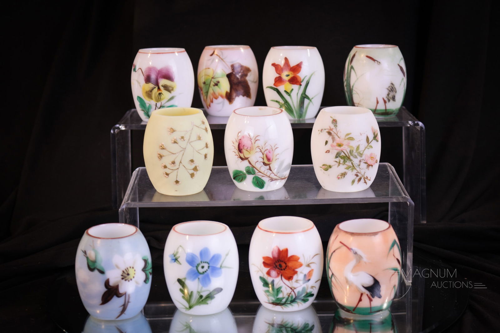 11 pc Lot Enameled Barrel Victorian Glass Toothpick Holders: Eleven fine examples of decorated milk glass barrel-form toothpick holders from the Victorian era. Each uniquely enameled. Each measures 2 1/4" tall.