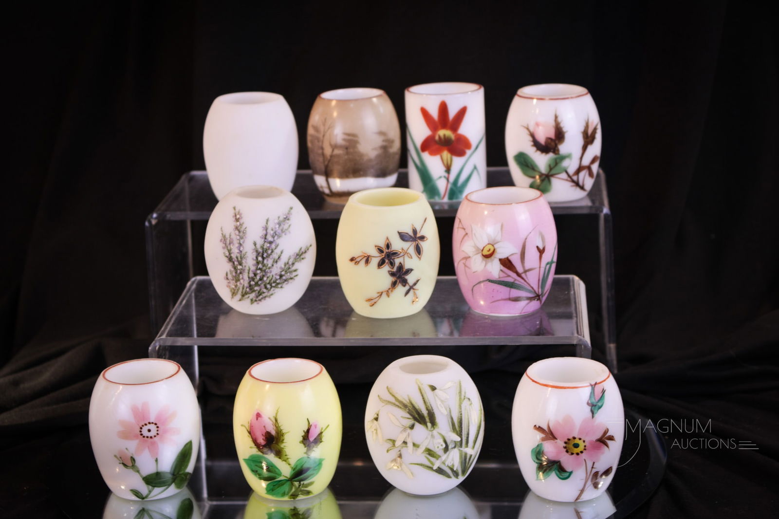 11 pc Lot Enameled Barrel Victorian Glass Toothpick Holders: Another selection of eleven fine barrel-form enameled glass Victorian toothpick holders. Each measures 2 1/4" tall.