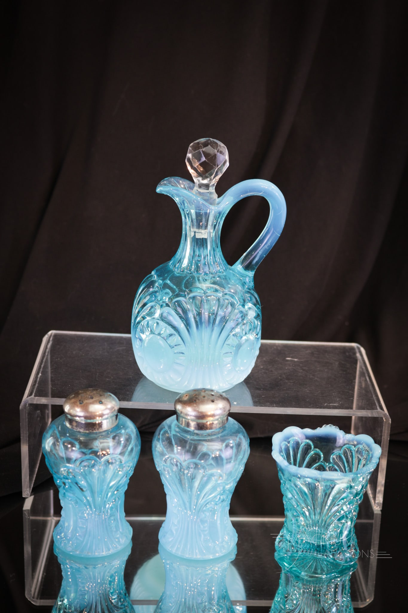 4 pc Lot Northwood Blue Opalescent Tokyo Glass Toothpick Shakers Cruet: Four great pieces of Northwood Tokyo pattern in brilliant blue opalescent. This lot includes a cruet, toothpick holder, and pair of shakers. Nice examples! Tallest measures 5 3/4".