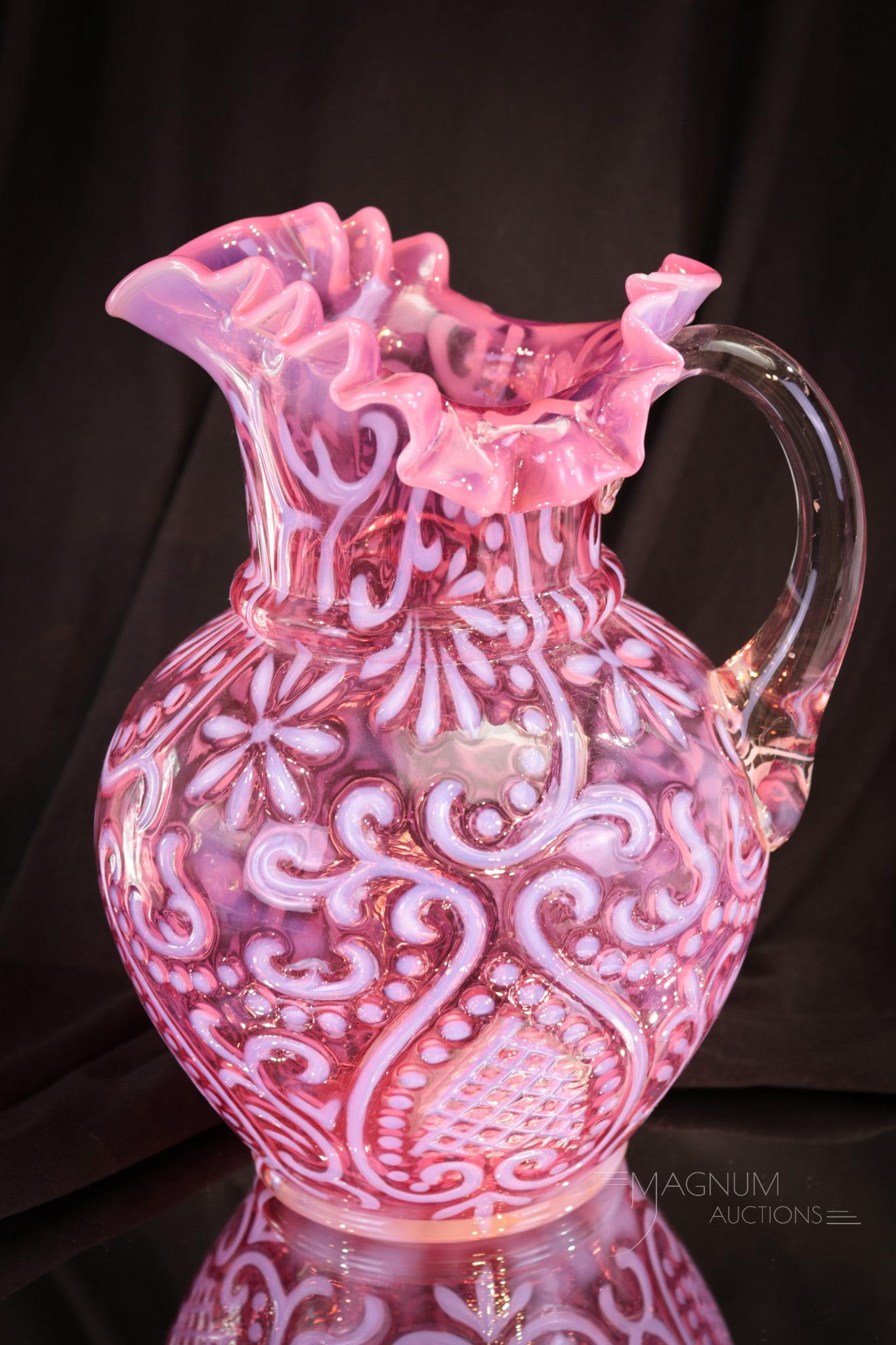 Cranberry Opalescent Arabian Nights Victorian Glass Pitcher: Super fine example of a Northwood Arabian Nights Victorian glass pitcher in cranberry opalescent. This pitcher has stand-out color and opalescence. Do you own one? Make sure to add it to your Christma