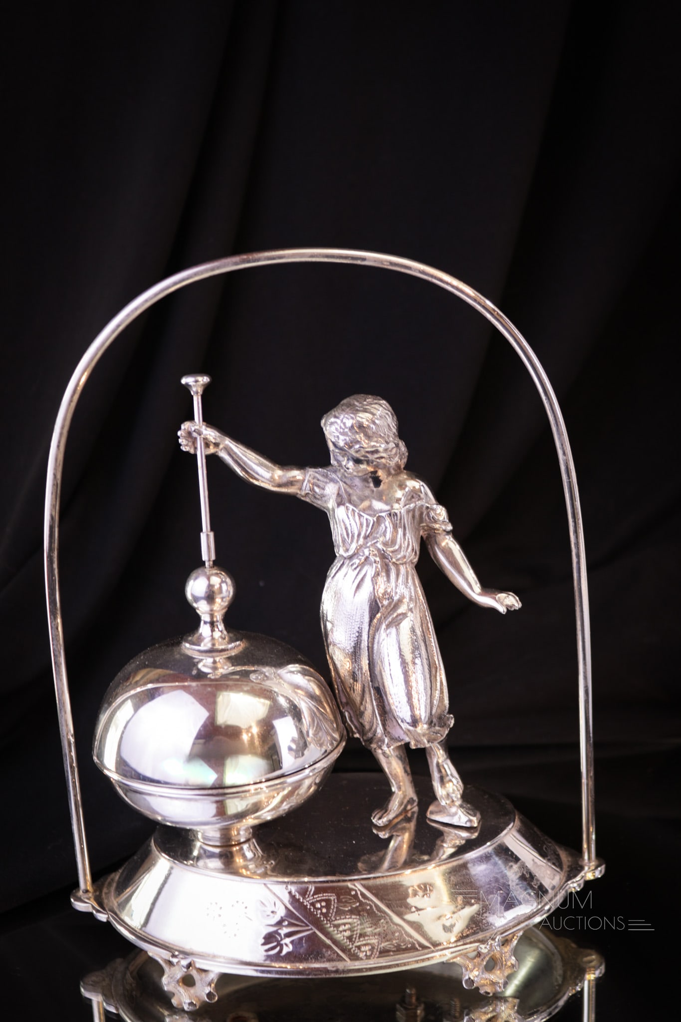 Meriden Silverplate Victorian Figural Call Bell: A very nice signed Meriden silverplate Victorian figural call bell. This one with lots of detail and in working order. This fine piece measures 8 1/2" tall. Provenance: This item is from the private c