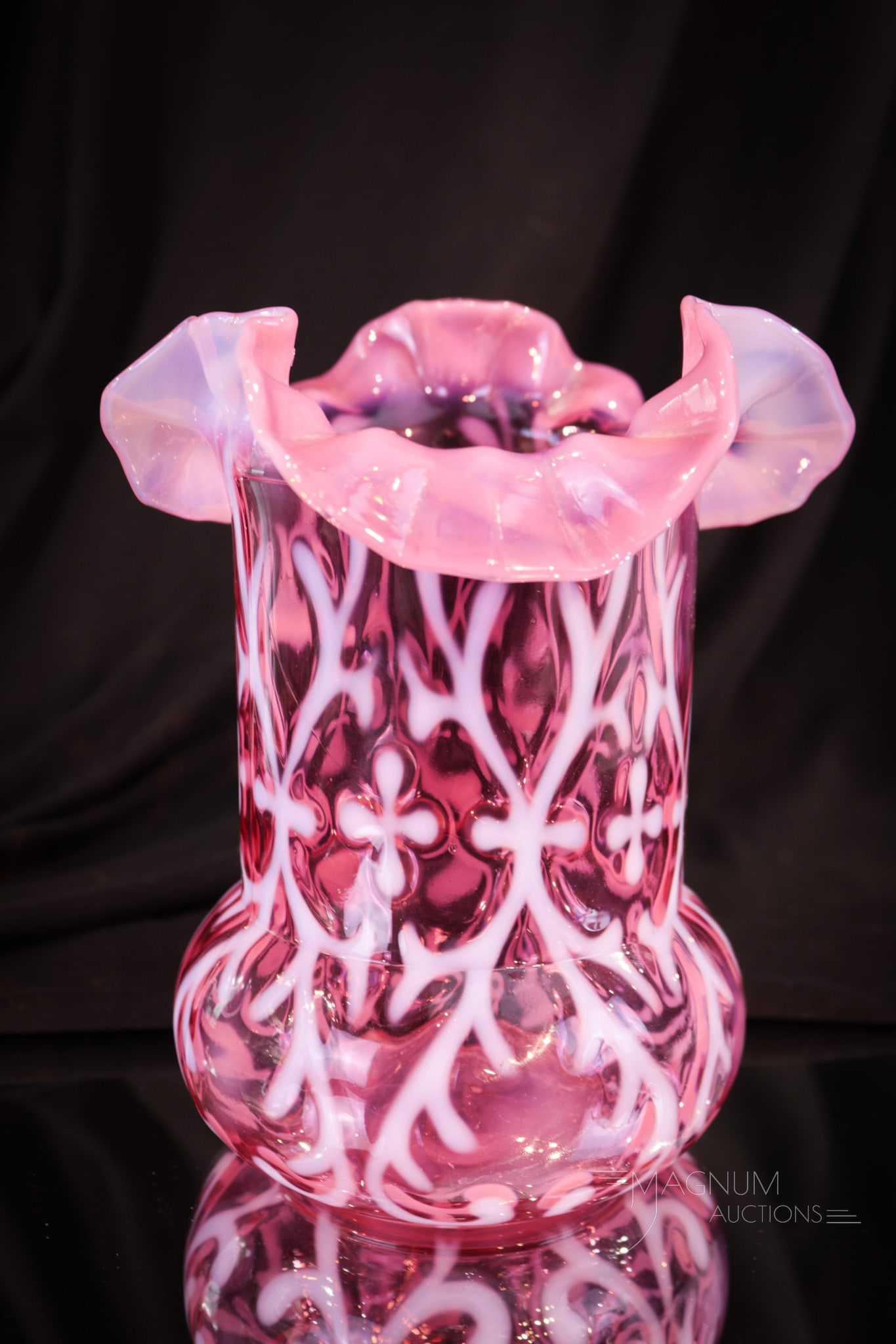 Northwood Cranberry Opalescent Spanish Lace Celery Vase: Deep rich cranberry and brilliant white opal make up this fine Victorian glass celery vase in the Spanish Lace pattern. It measures 6" tall.