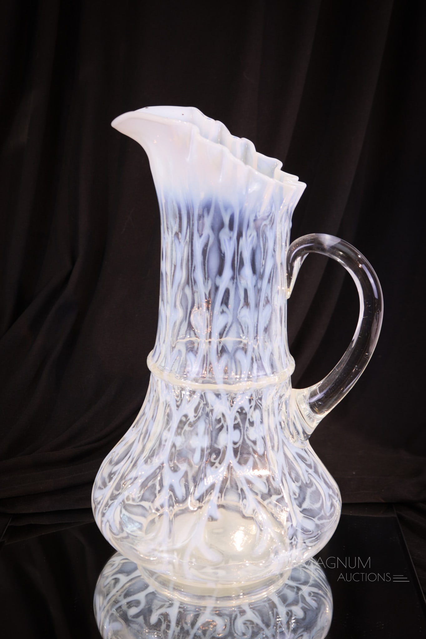 Northwood Opalescent Spanish Lace Ribbon Tie Mold Victorian Tankard Pitcher: Fine and seldom found Northwood Ribbon-Tie Mold Victorian glass tankard pitcher. This one in crystal opal. So seldom seen. Tankard measures 12" tall.