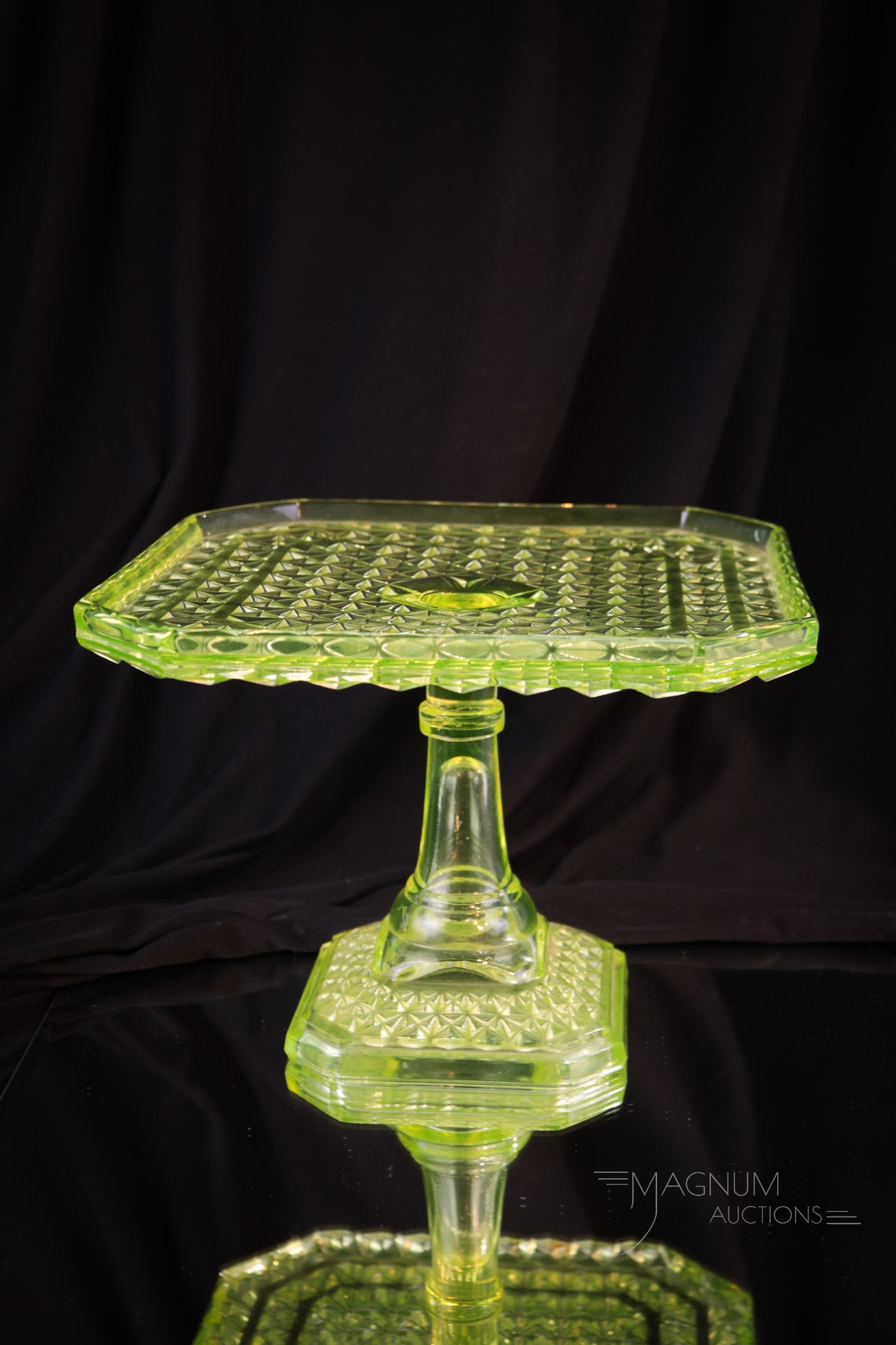 Scarce Vaseline Daisy & Button Victorian Glass Pedestal Cake Plate: Beautiful and scarce find in this Vaseline pedestal cake plate from the Victorian era in the Daisy and Button pattern. Piece measures 6 1/4" tall 8" wide.