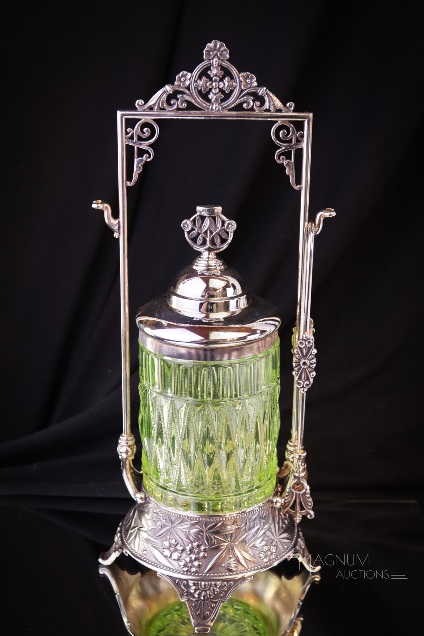 Vaseline Simpson Hall Miller Silverplate Victorian Glass Pickle Castor: A superb addition to any collection! This signed Simpson, Hall, and Miller Victorian silverplate frame is complete with vaseline Beaded Diamond glass insert. Castor measures 12" tall.