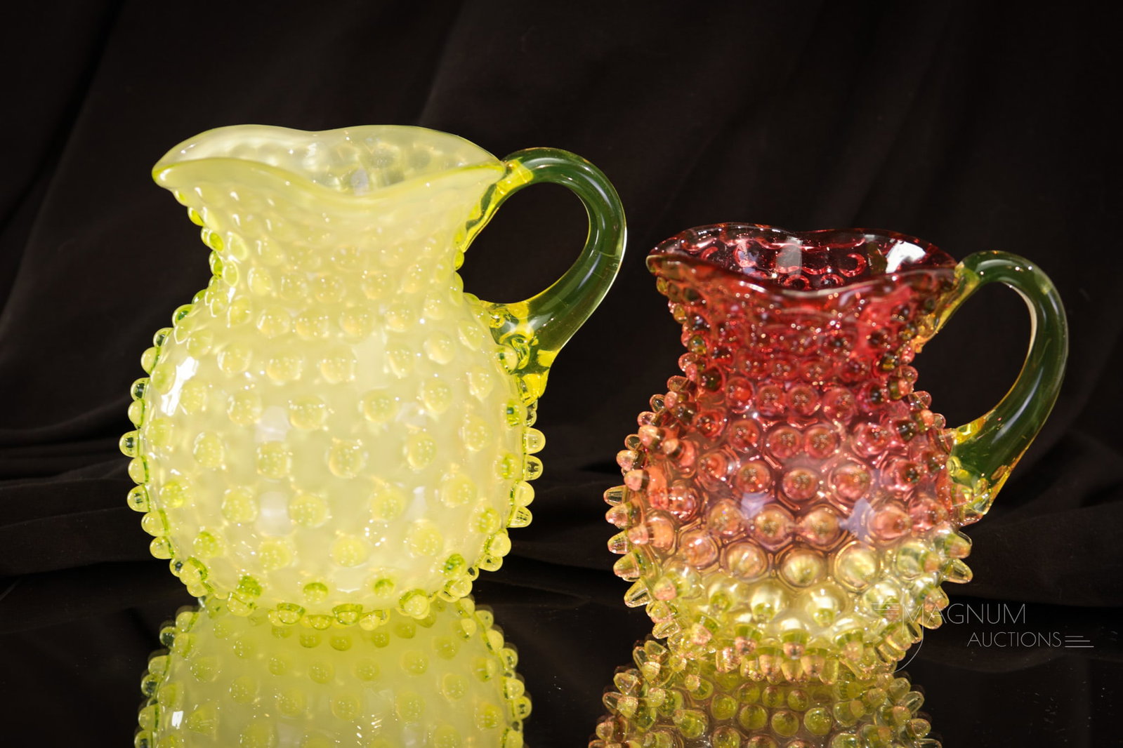 2 pc Lot Hobb's Hobnail Vaseline & More Victorian Glass: Two wonderful finds in Hobb's vaseline glass. We have combined a vaseline cased alabaster creamer along with a rubina verde child's pitcher. Both in the hobnail pattern. Tallest measures 4 3/4". The s