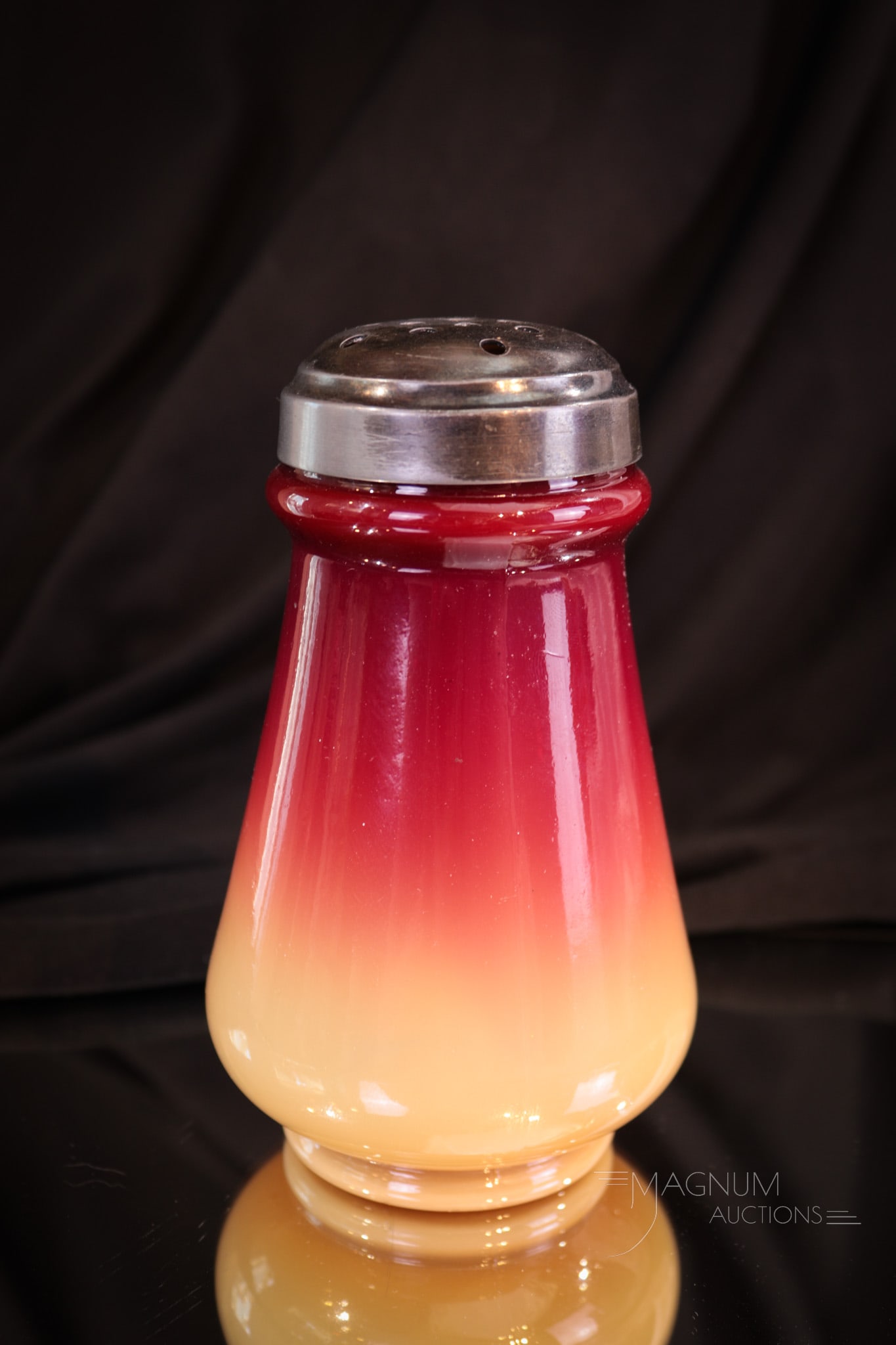 Victorian Hobb's Wheeling Peachblow Glass Sugar Shaker: This piece speaks for itself. Great coloring and sleek form make this a welcome addition to any collection. Sugar shaker is complete with original lid. Shaker measures 5 1/4" tall. Provenance: This it