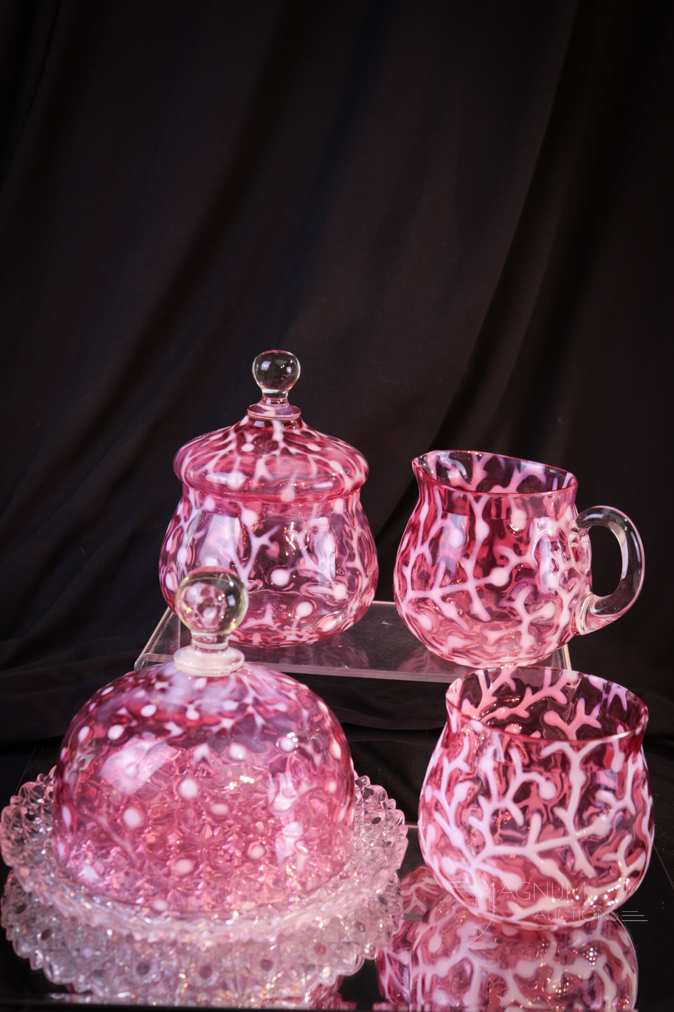 4 pc Hobb's Victorian Cranberry Opalescent Seaweed Glass Table Set: Four great finds in Victorian cranberry opalescent Seaweed pattern that make up the table set. Each a super example. Tallest measures 5 1/2" tall. Possible as-made chips to rim of the butter lid and a