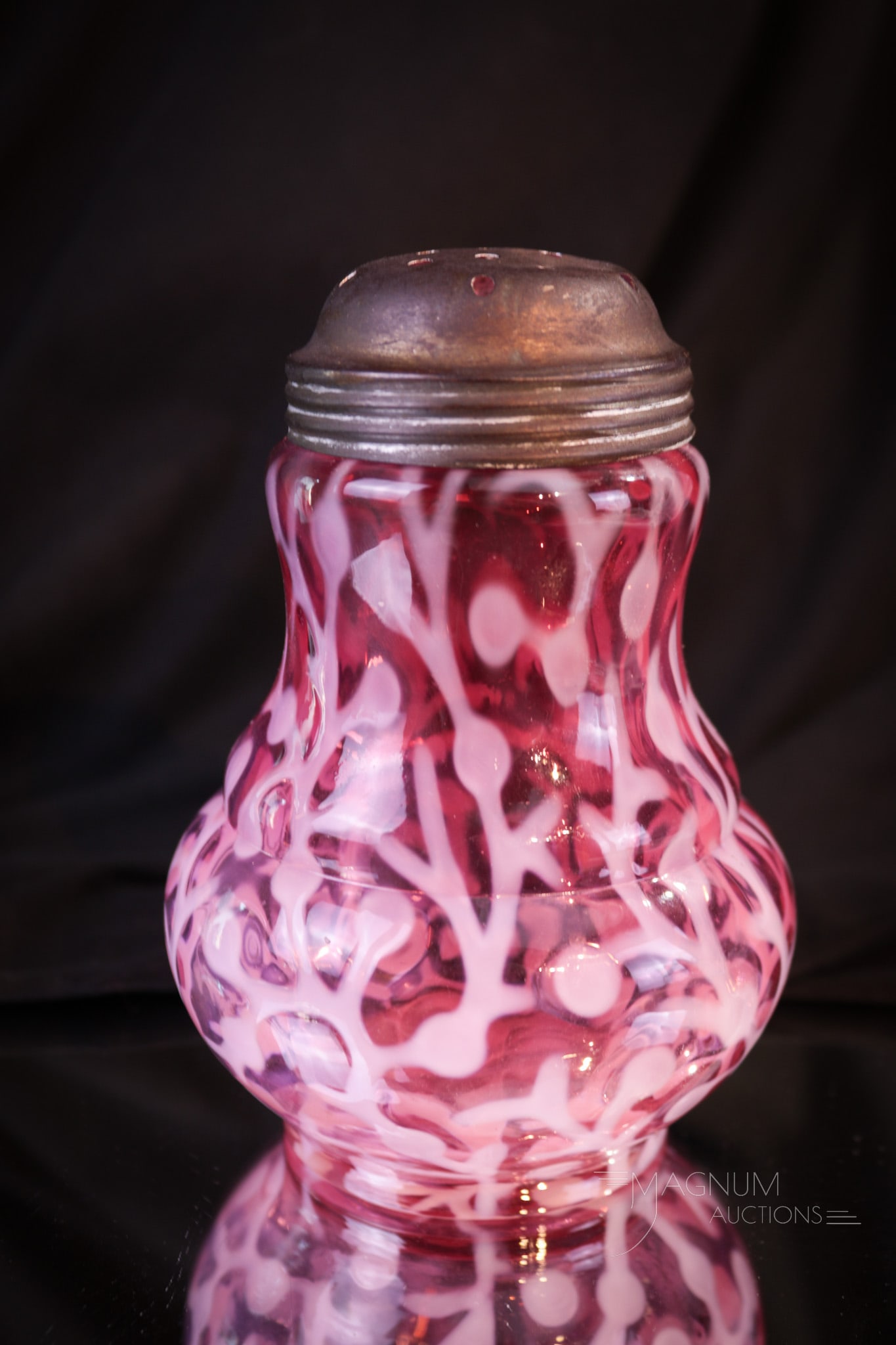 Hobb's Victorian Cranberry Opalescent Glass Seaweed Sugar Shaker: Wonderful Hobb's cranberry opalescent Victorian glass Seaweed pattern sugar shaker. A pristine example to add to your collection. This shaker measures 5" tall.